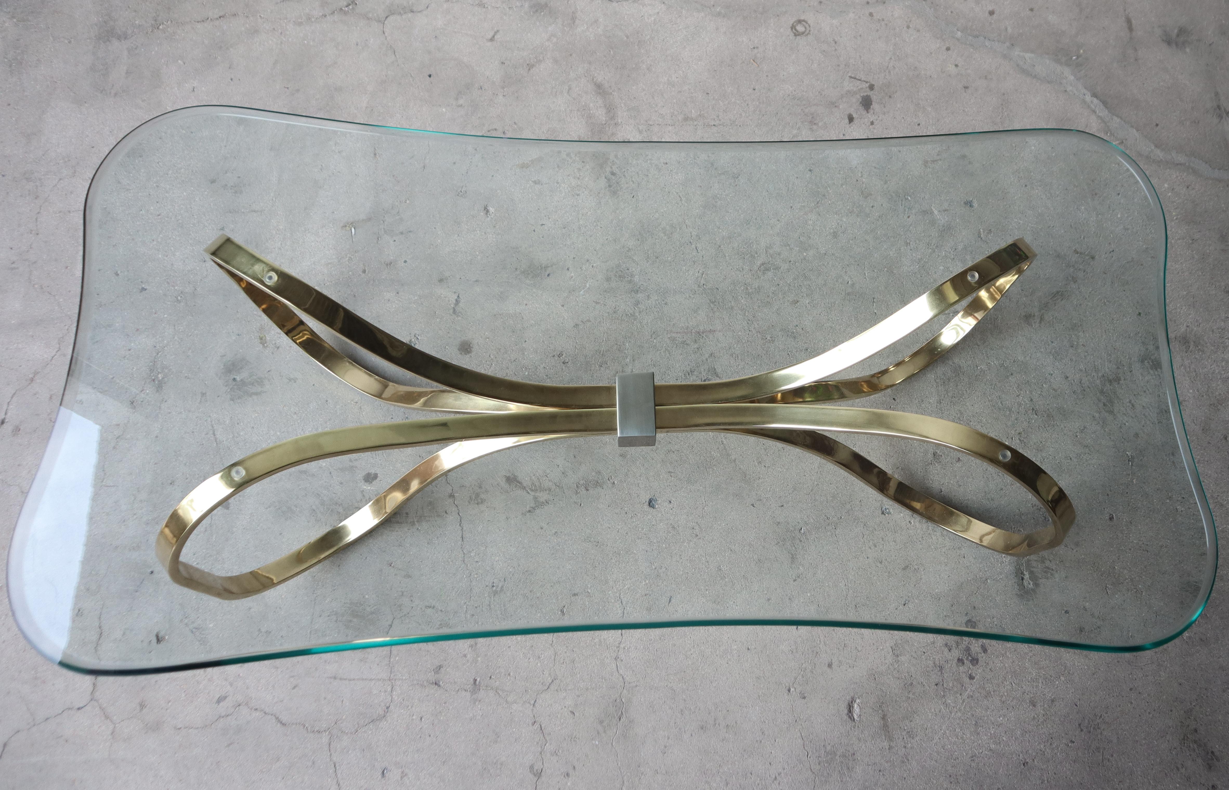 20th Century Regency Brass and Glass Bow Tie Coffee Table For Sale