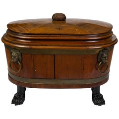 Cellaretta Regency in mogano ebanizzato con montatura in ottone