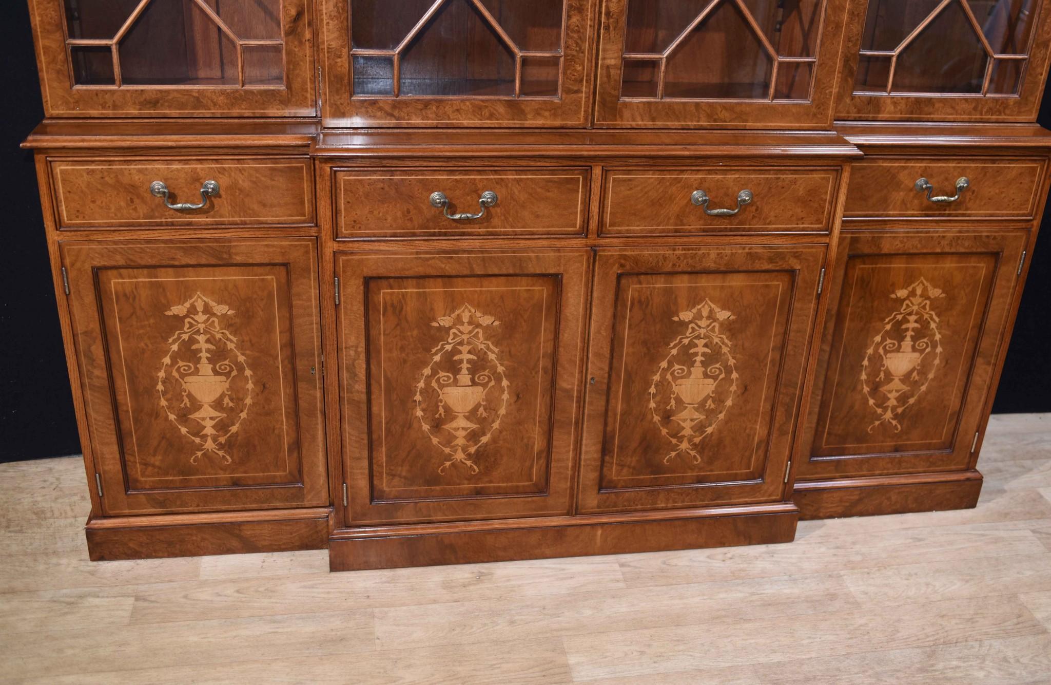 - You are viewing a gorgeous English Sheraton style breakfront bookcase in burr walnut
- I hope the photos does this important piece some justice, it\'s certainly more impressive in the flesh
- The inlay work is amazing and includes typical