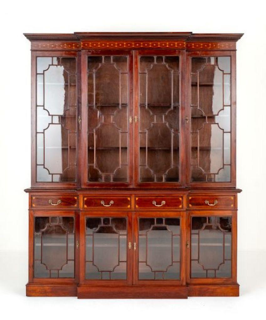 Sheraton Revival Mahogany Breakfront Bookcase (Stamped Lamb and Co)
Circa 1880
This Quality Breakfront Bookcase is Rather Unusual Having Glazed Doors to the Lower and Upper Section.
The Oak Lined Drawers Featuring Quartered Fans and Boxwood and