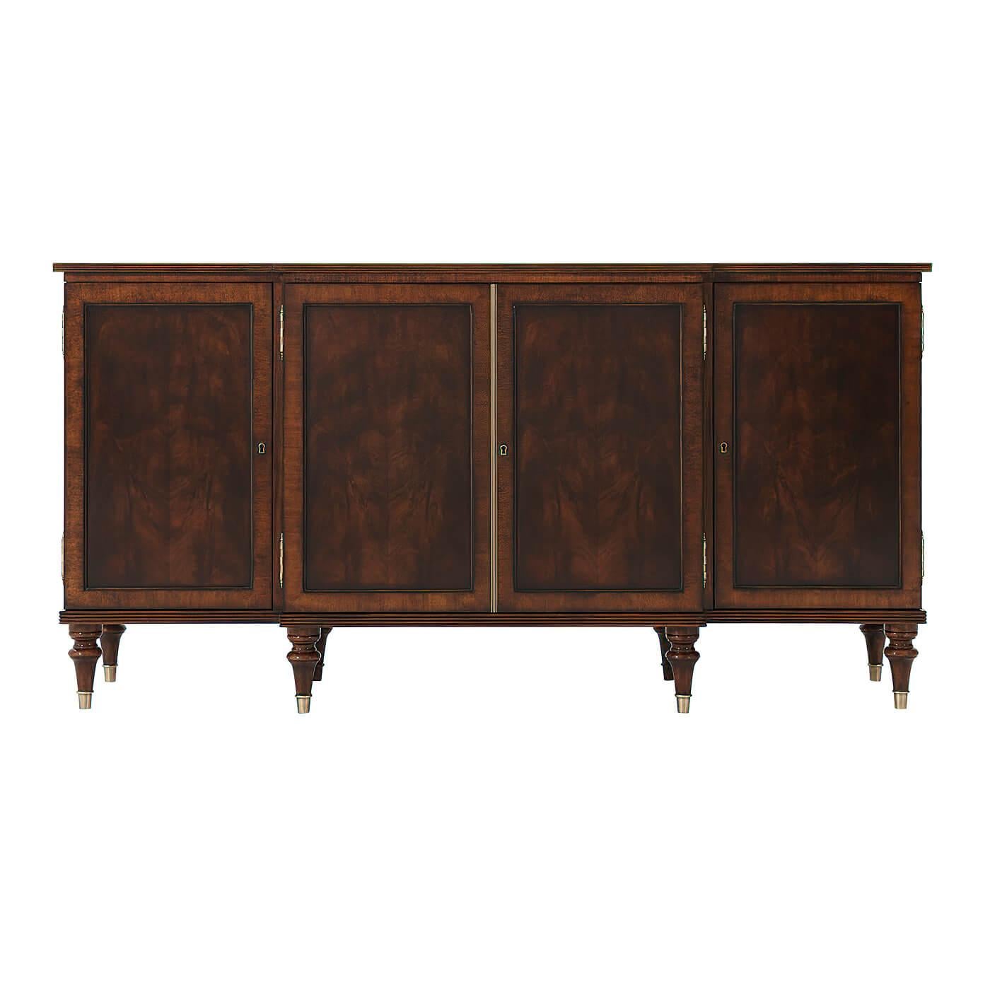 A Regency style swirl mahogany veneered and satinwood crossbanded side cabinet, the breakfront reeded edge top above four doors, the central doors enclosing two drawers and an adjustable shelf, the side doors each enclosing adjustable shelves, on