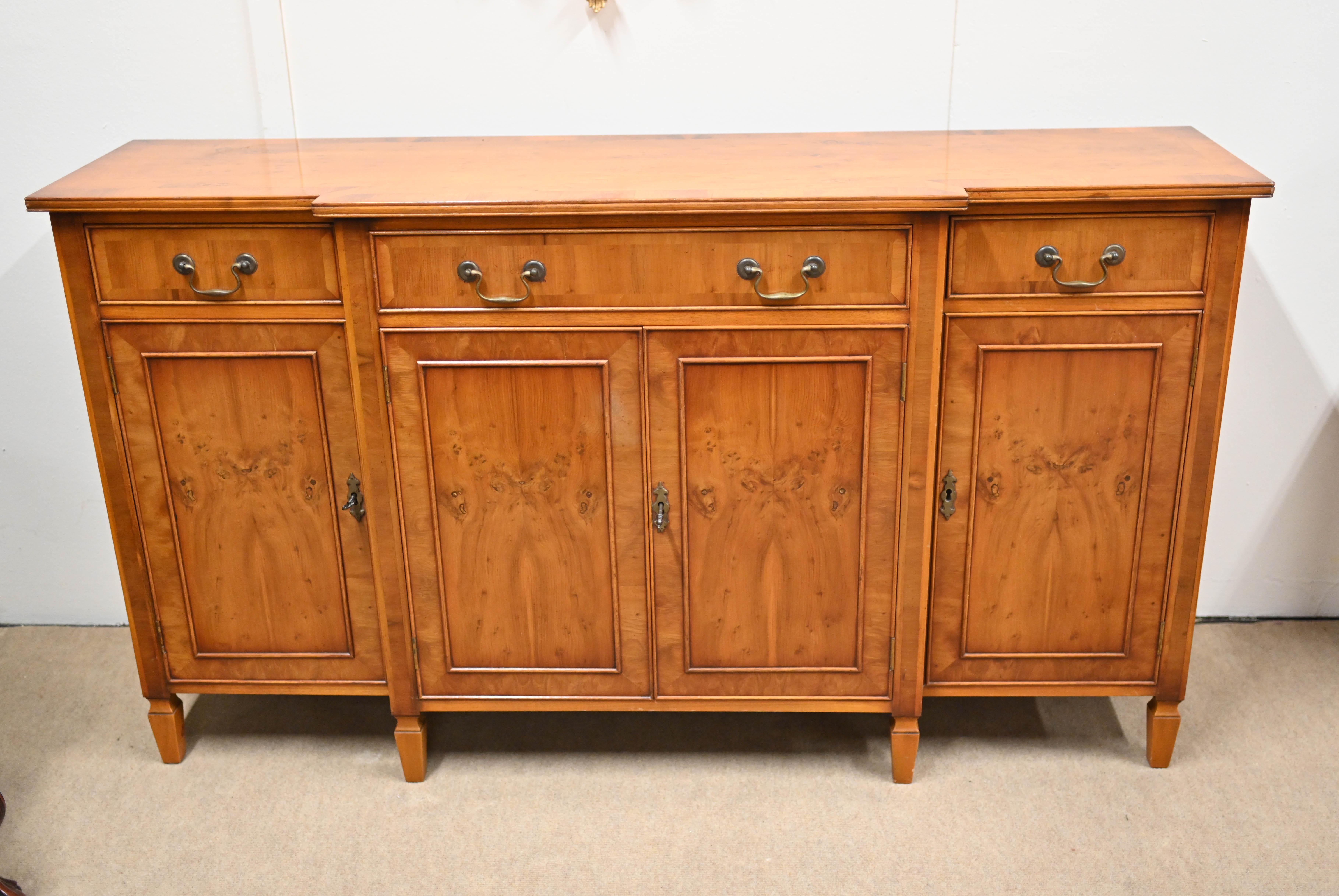 Characterful breakfront sideboard in the Regency style
Love the finish and patino the yew wood
Drawers at the top features felt finished interiors for cutlery
Circa 1930
Offered in great condition ready for home use right away
Will ship to anywhere