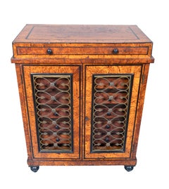 Credenza de ébano y olmo rebabas Regency