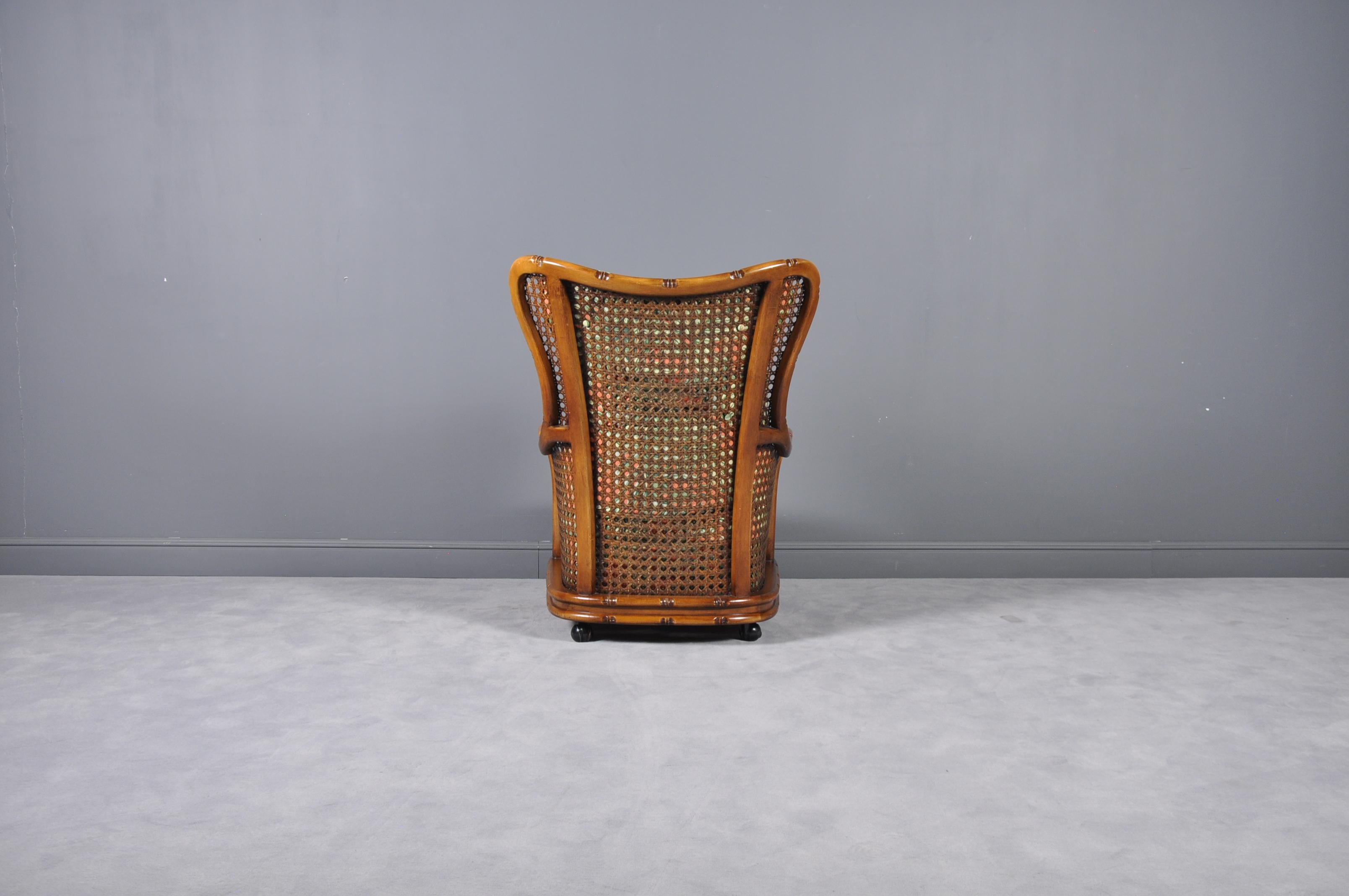 English Regency Caned Bamboo Armchair on Wheels, 1970s For Sale
