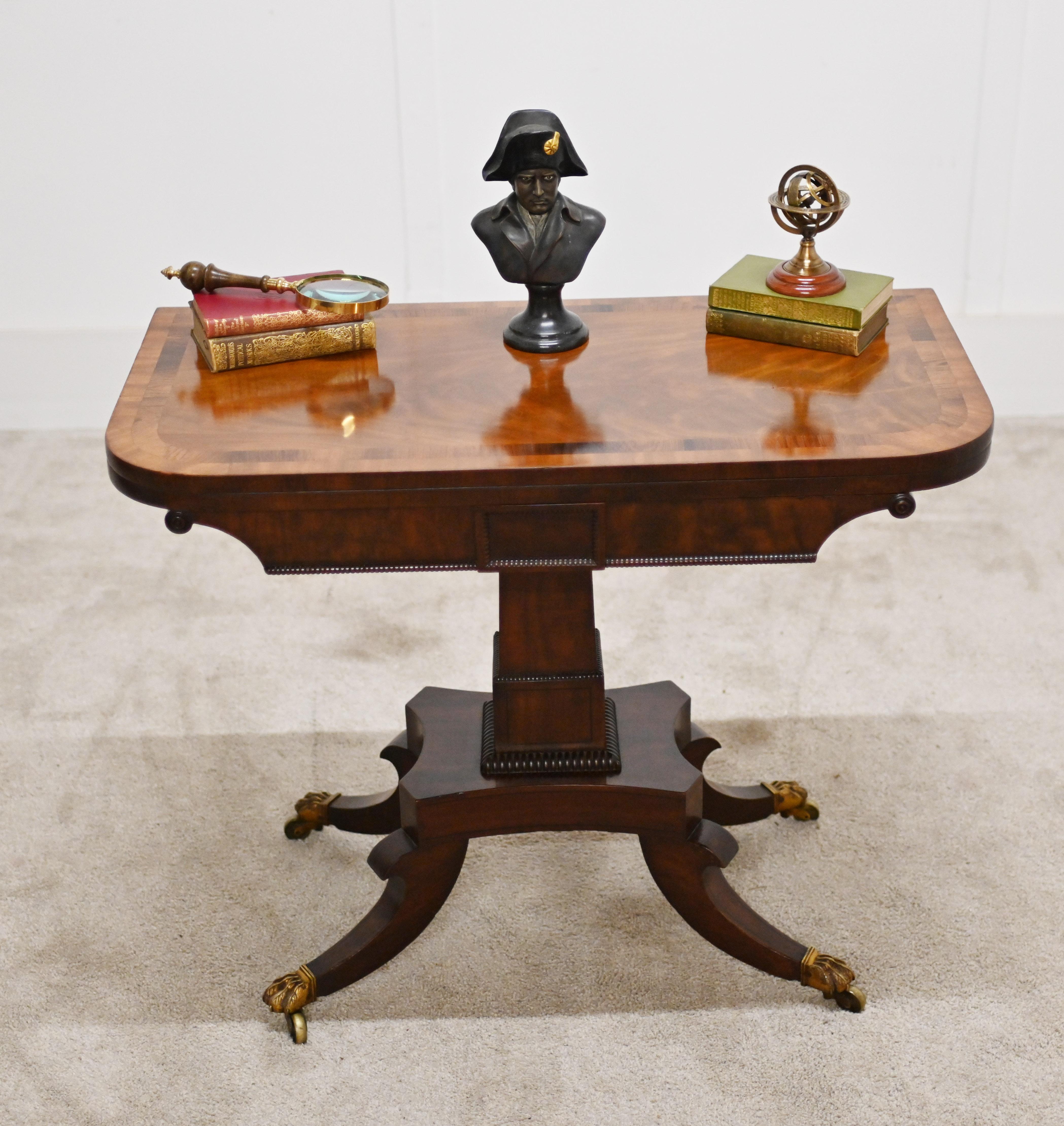 A gorgeous Regency mahogany card table crossbanded supported on splay legs terminating in brass claw feet
Circa 1810
Top opens up to reveal red baize playing surface
Bought from a private residence in London's Mayfair
Offered in great condition