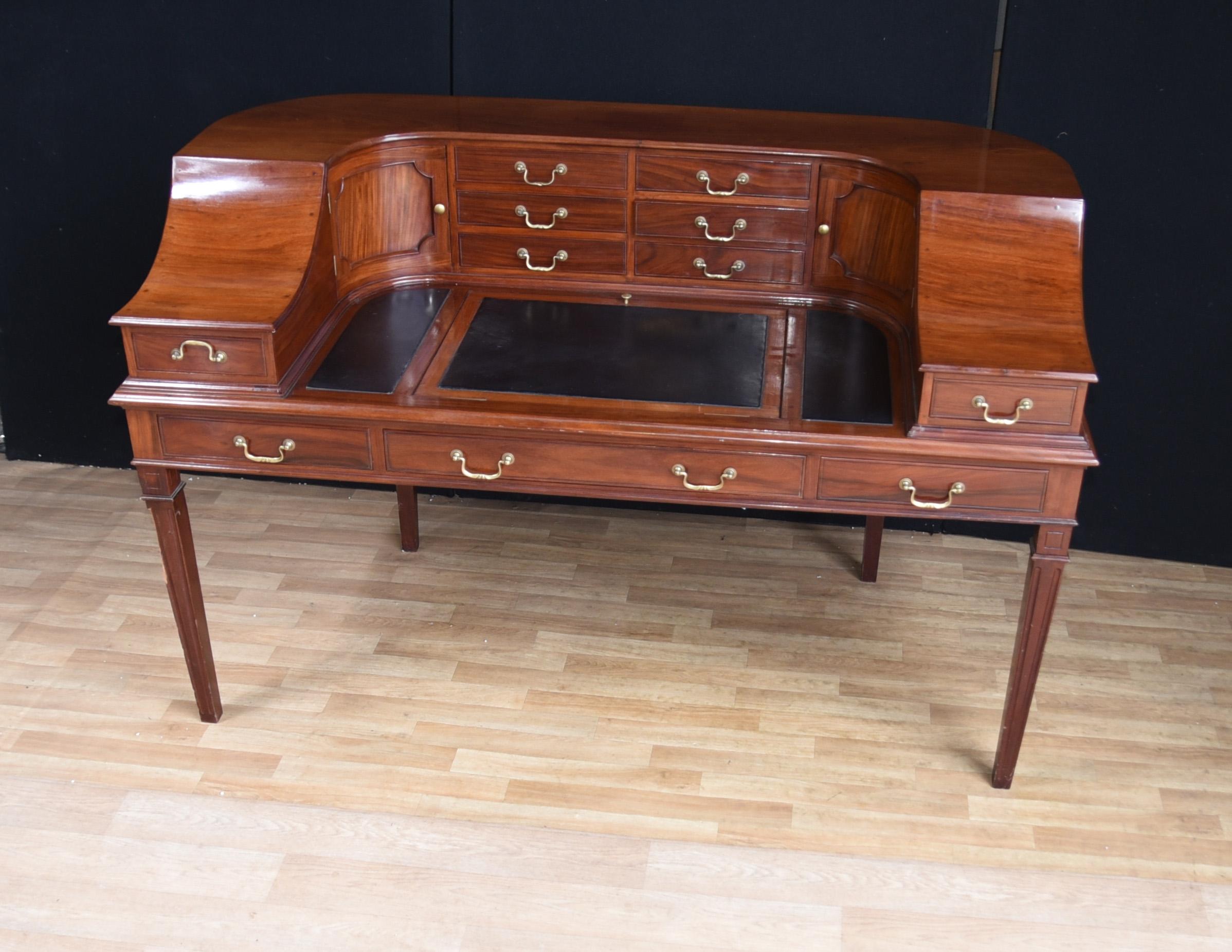 - Gorgeous Regency style Carlton House desk in mahogany
- Very elegant piece, love the curves to the design
- We date this antique to circa 1920
- Also very attractive grain and patina to the walnut
- Very comfortable to sit and work at, great