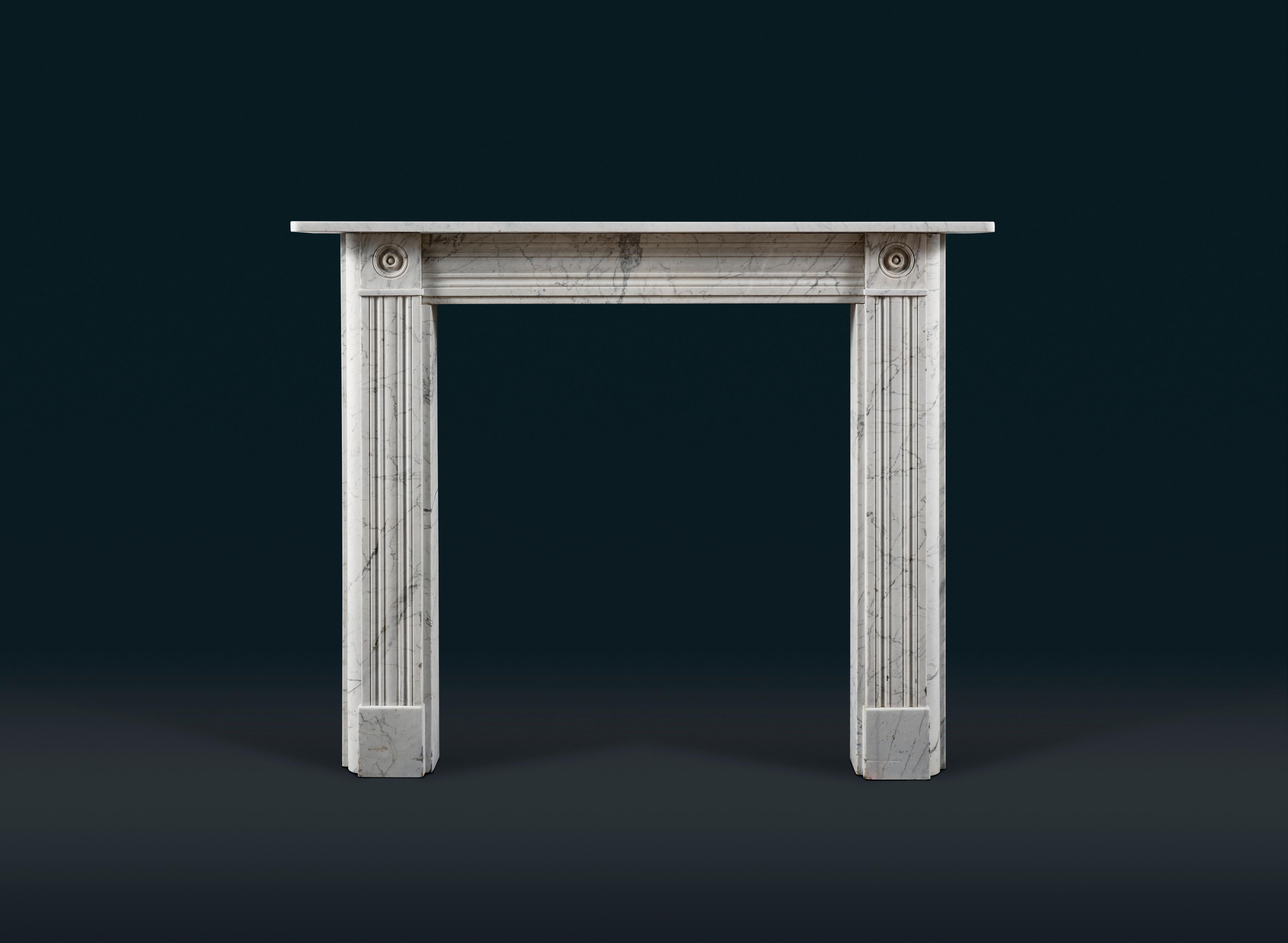 British Regency Carrara Marble Bullseye Fireplace Surround For Sale
