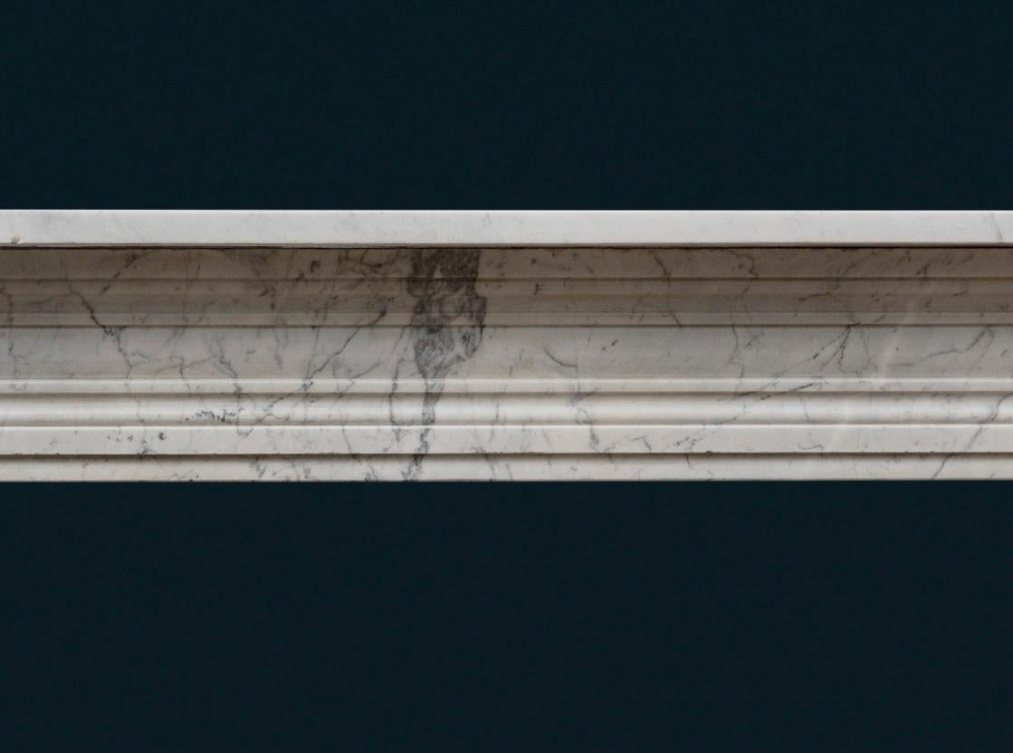 Hand-Carved Regency Carrara Marble Bullseye Fireplace Surround For Sale