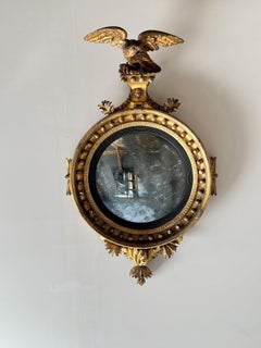 Specchio da parete convesso in legno dorato intagliato Regency