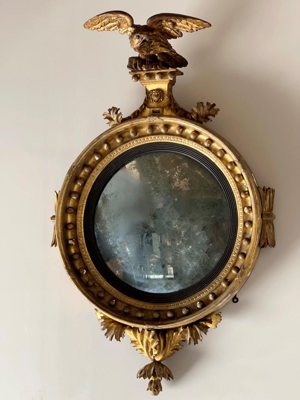 English Regency Carved Giltwood Convex Wall Mirror For Sale