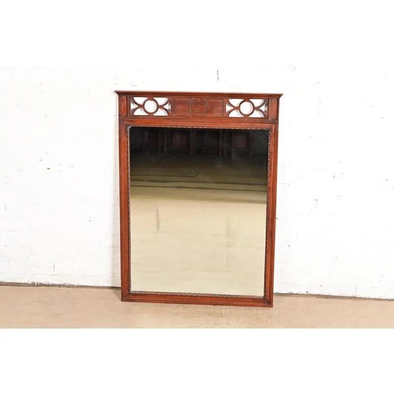 Hollywood Regency Regency Carved Mahogany Wall Mirror by West Michigan Furniture Co., Circa 1940s For Sale