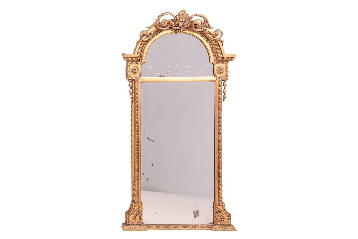 Regency Giltwood and Gesso Pier Mirror with Intaglio Mirror Plate, England, circa 1815
A fine early 19th century Regency pier glass, English, circa 1815.

This elegant mirror features a finely carved and gilded wooden frame with applied gesso