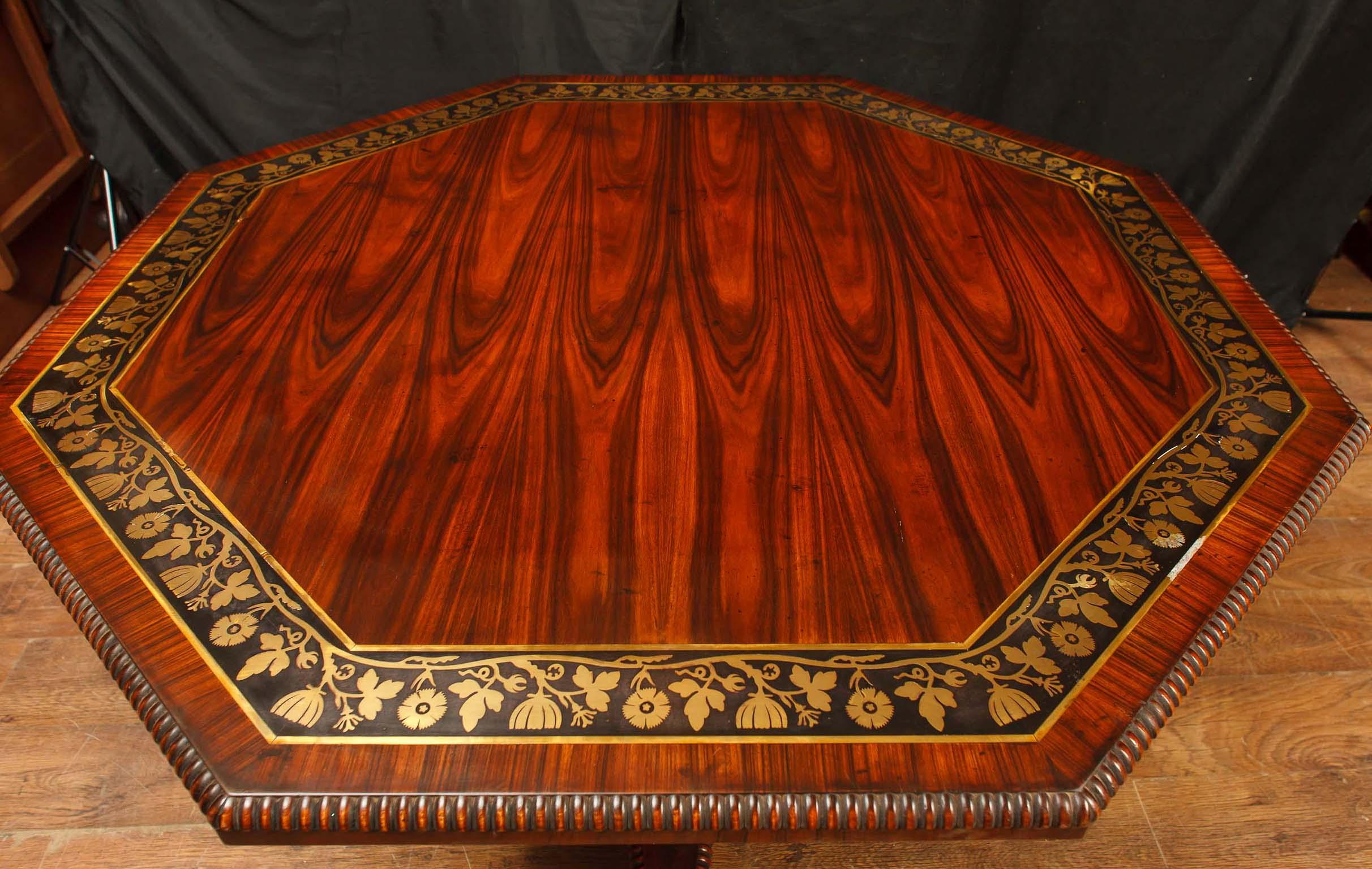 Gorgeous English Regency octagonal centre table in rosewood
Incredible and intricate brass floral inlay in black banding to perimeter of table top
Table is in wonderful condition - solid and wobble free, ready for home use
Hand carved gilt