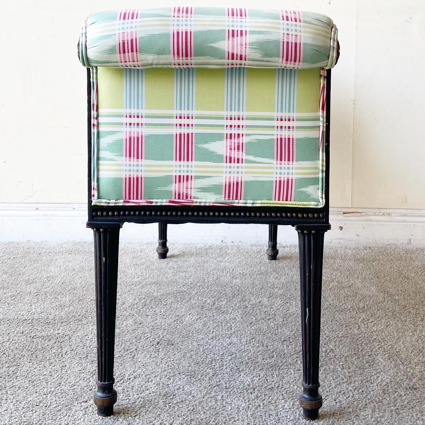 Excellent regency chic bench with scroll arm rests. Features a pink green and blue fabric over a painted wooden frame.
    