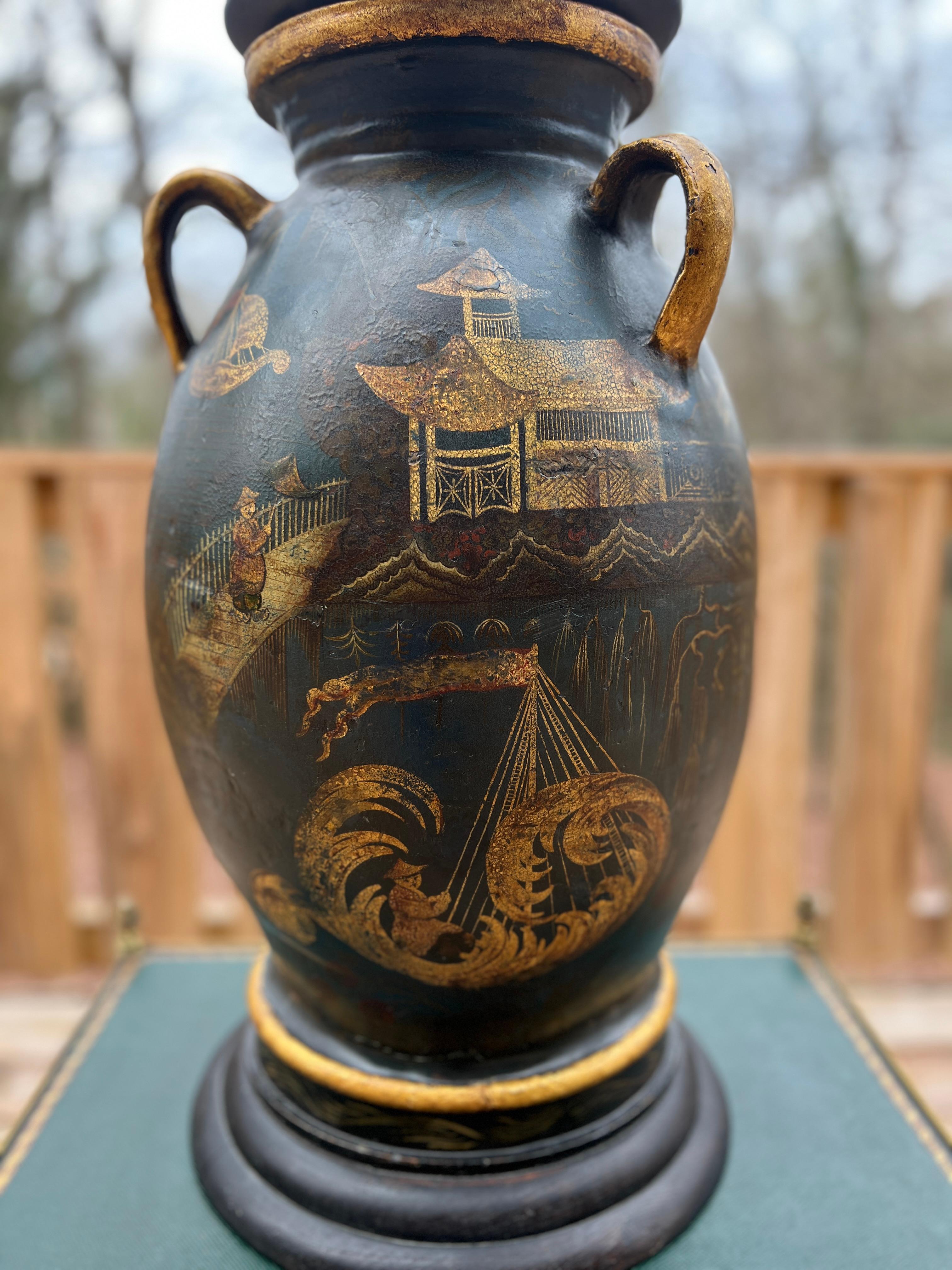 English or French, Circa 1820.

Regency Chinoiserie Decorated Gilt Wood & Tole Pagoda Design Handled Urn or Centerpiece, crafted circa 1820. This exquisite piece stands as a testament to the opulence and sophistication synonymous with the
