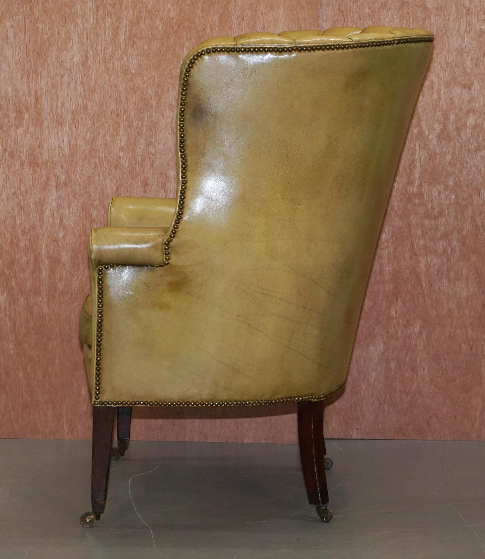 Regency circa 1815 Fluted Barrel Back Leather Wing Armchair and Matching Stool For Sale 6