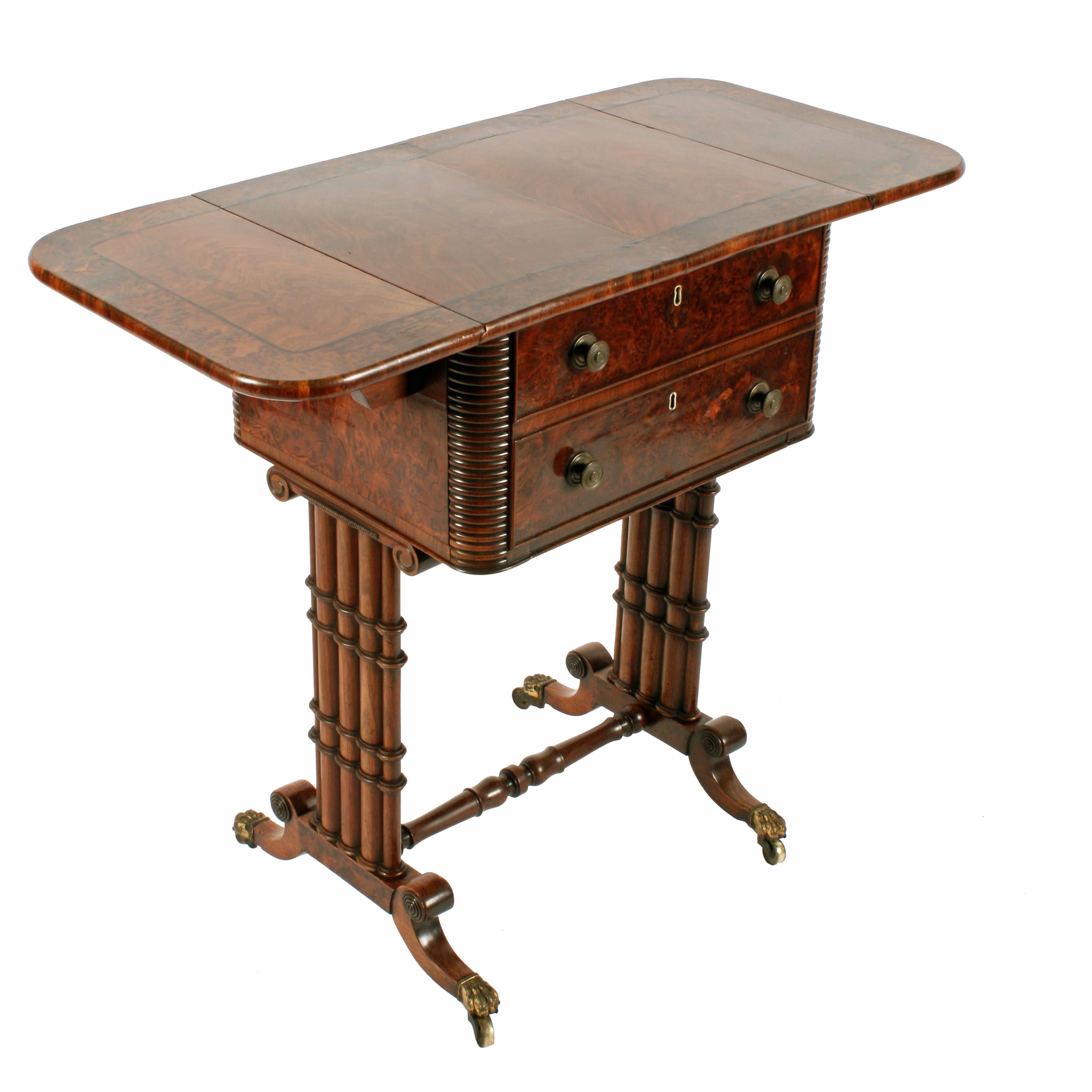 Regency cluster column base side table


An unusual Regency mahogany and amboyna drop leaf one drawer side table.

The table is supported on a pair of cluster column mahogany ends with short sabre legs that have gilt brass claw casters.

The