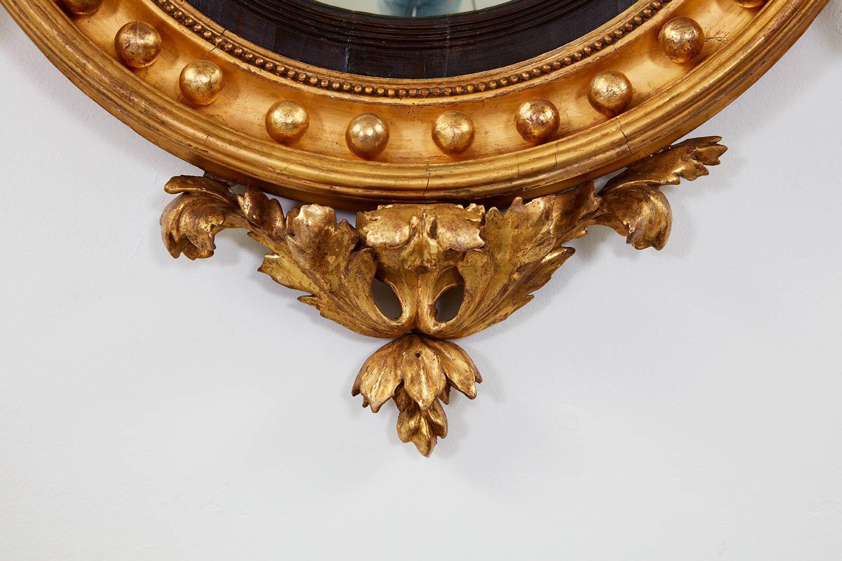 Hand-Carved Regency Convex Giltwood Mirror For Sale