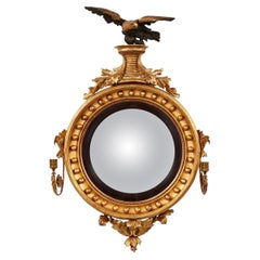 Espejo de madera dorada convexa Regency