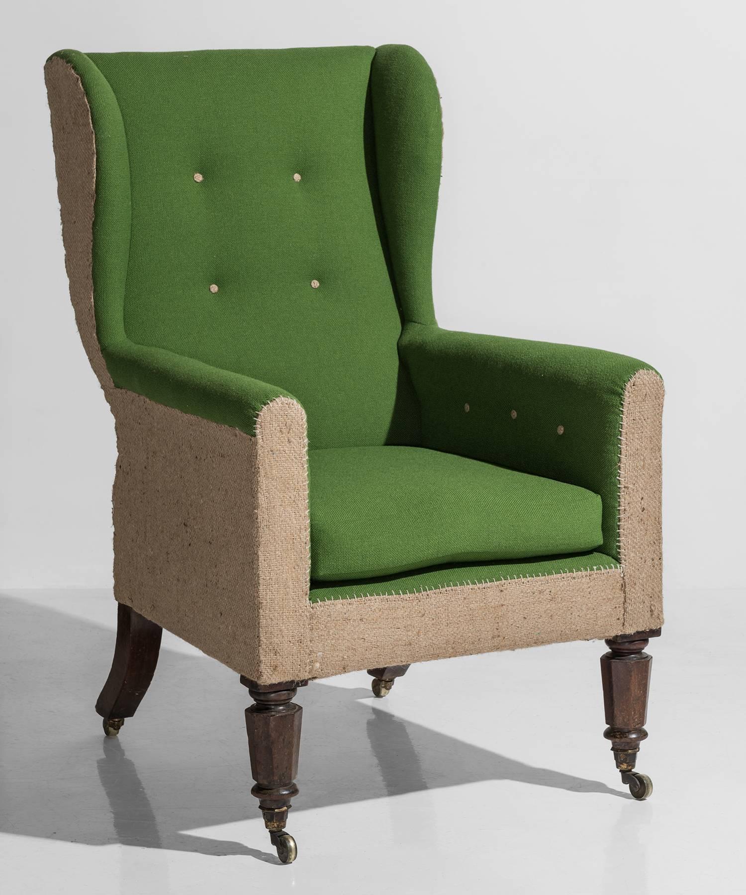 Regency Country armchair, circa 1820

Handsome form, newly upholstered in contrasting burlap and cotton. Features original legs and brass casters.

Measures: 18