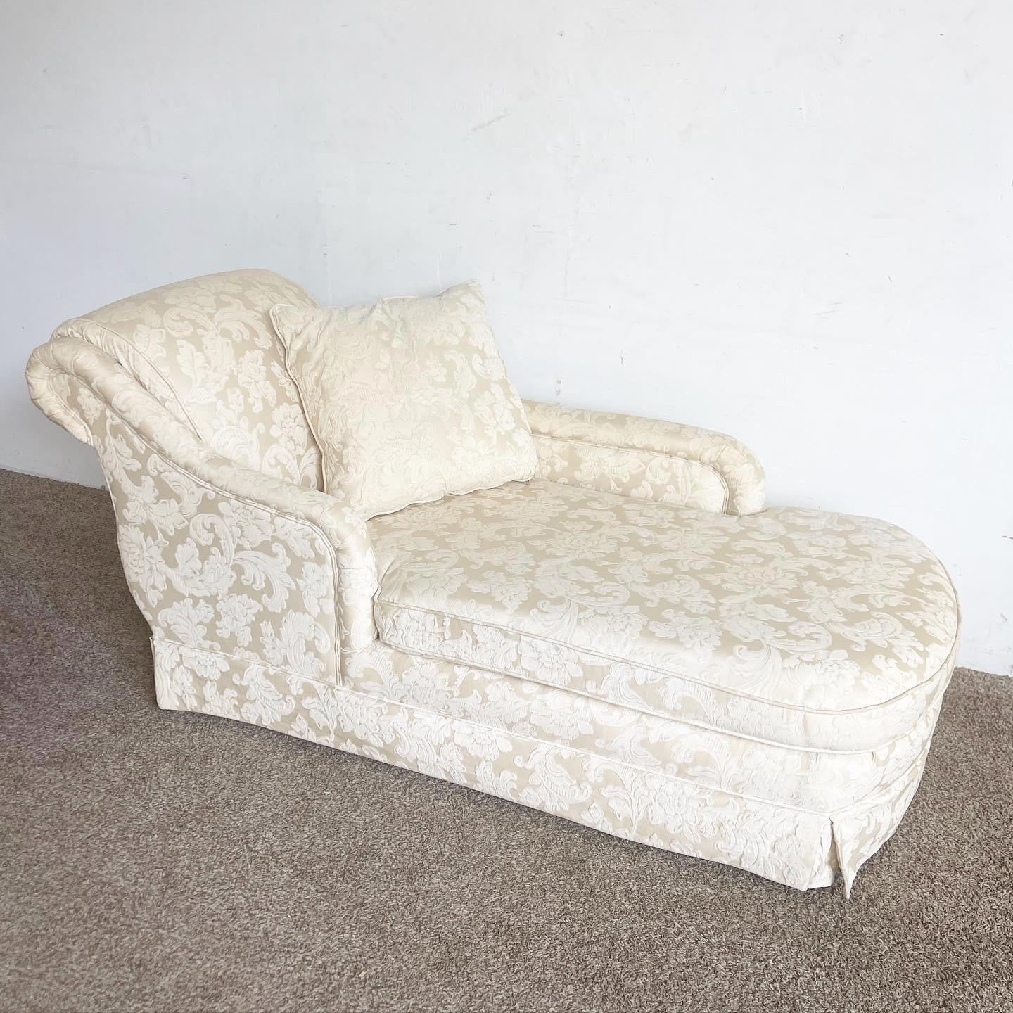 Step into the world of luxury with this Cream Regency Chaise Lounge. Upholstered in a sophisticated cream fabric, it boasts the signature curves and ornate details of the Regency era. Beyond its aesthetic appeal, this chaise offers a comfortable