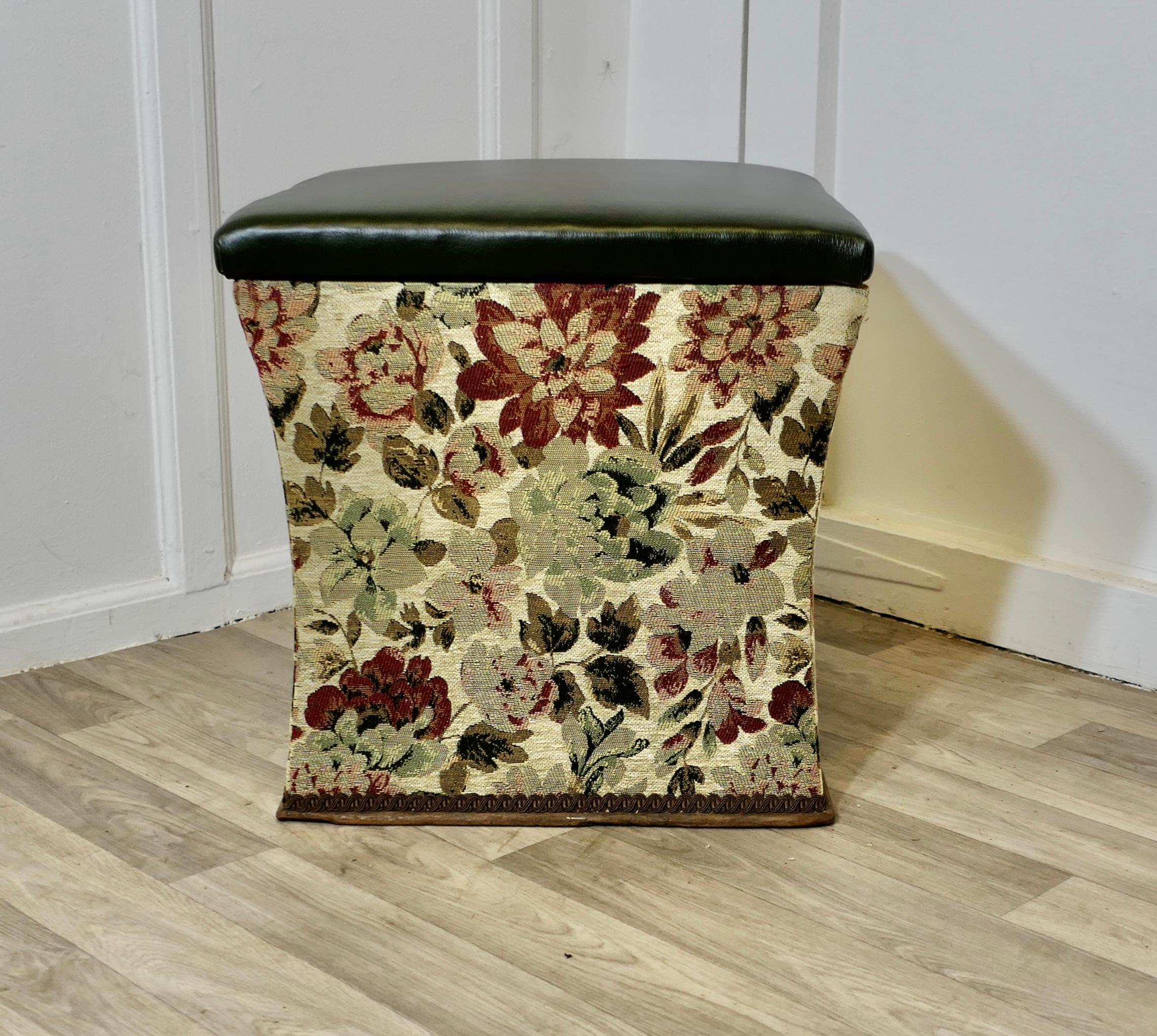  Regency Curved Upholstered Ottoman or Window Stool

The lower part of the piece is upholstered with sculptured brocade in Gold Green and Red and the top is in soft green leather and the inside is upholstered in tan calico 
The ottoman is an elegant