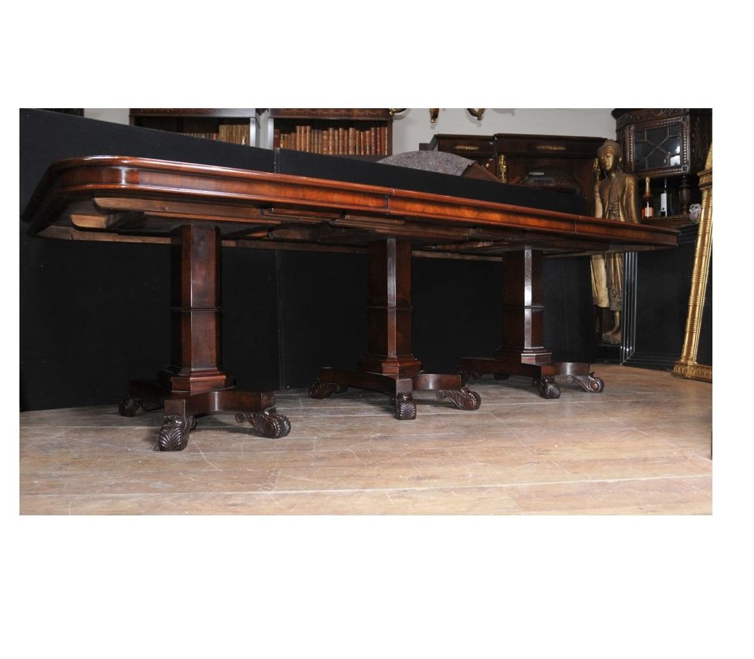 Sumptuous Regency style dining table in mahogany in the style of George Bullock
Triple pedestal dining table which extends to 12 feet (365 CM) with the two extra leaves in
The table is bespoke and hand made to order by our team of craftsman to