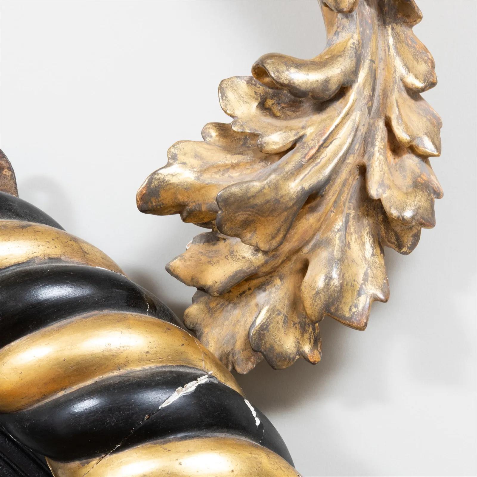 Espejo Girandole de Dos Luces Ebonizado y Dorado a la Parcela de la Regencia principios del siglo XIX en venta