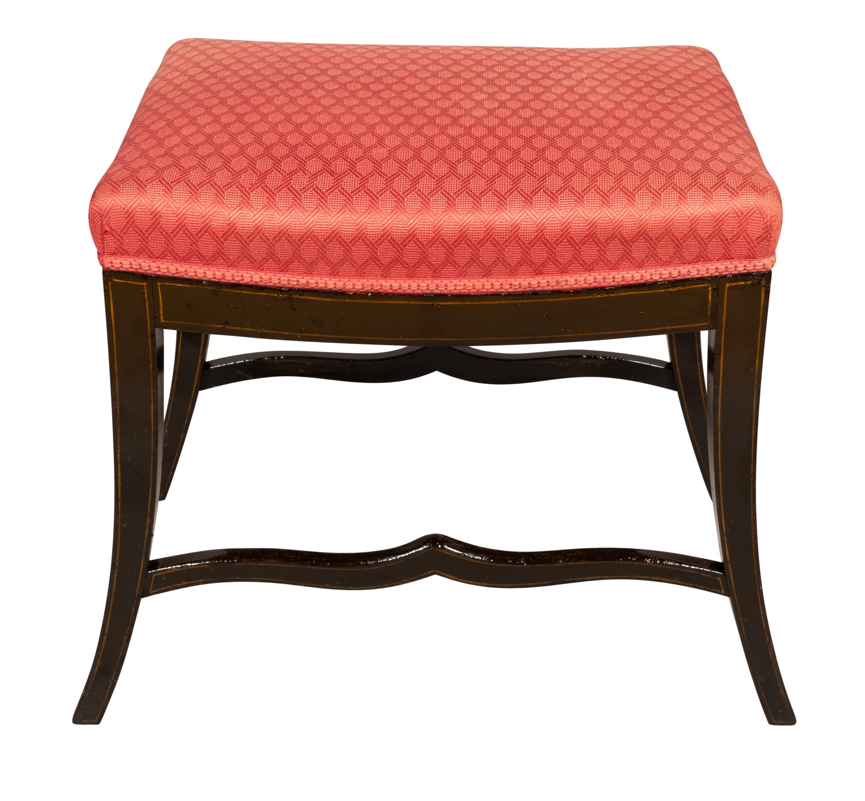 With rectangular upholstered seat. [used fabric]. With splayed legs and curved stretchers.