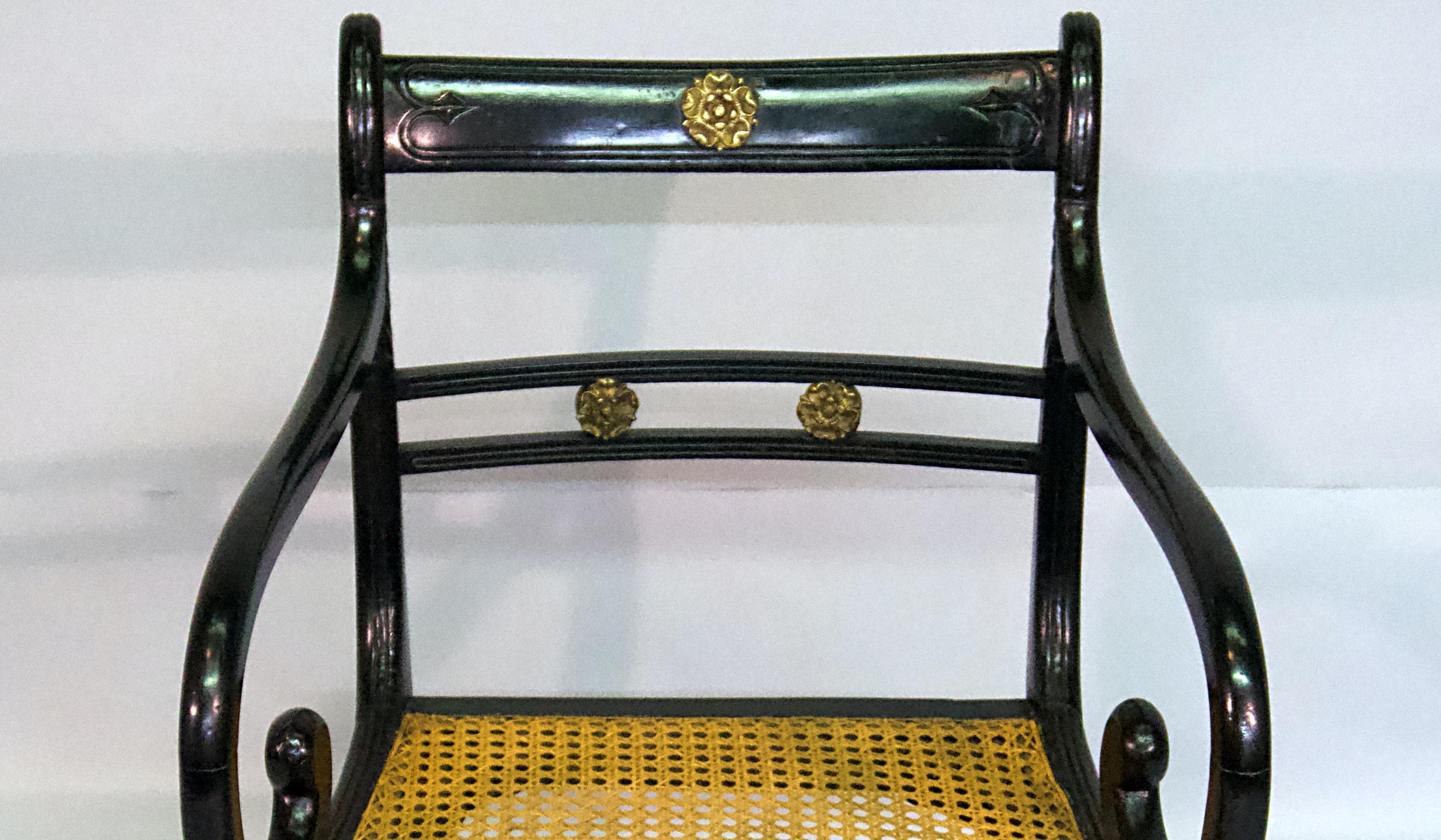 English Regency Ebonized Caned Armchair