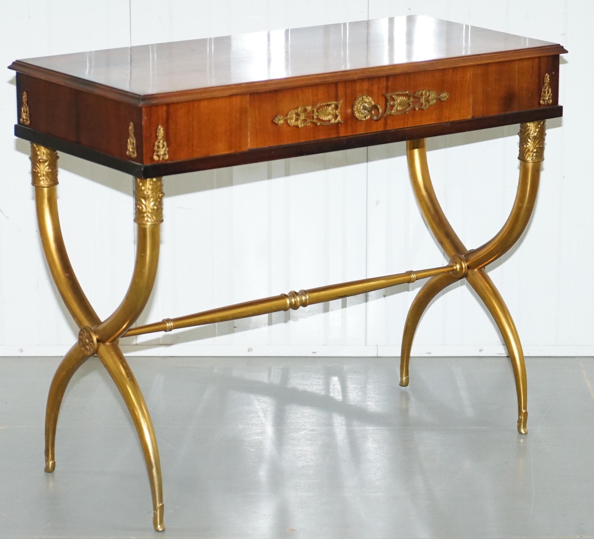 We are delighted to offer for sale this vintage Regency neoclassical style console table with brass legs and mounts

Wonderfully ornate with elegant lines, the legs scream Regency decadence but naturally, it’s a neoclassical style

Most likely
