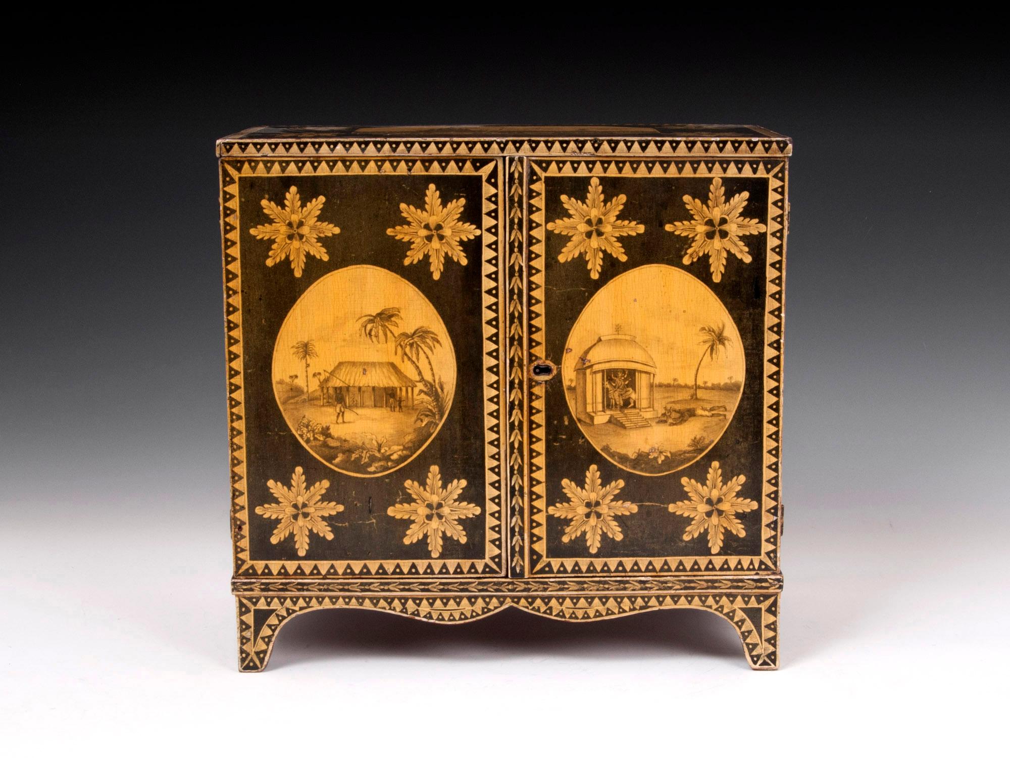 Extremely Rare Regency Antique Penwork Cabinet

A very interesting and rare Antique Regency Penwork Cabinet decorated with numerous scenes of exquisite detail. This unique piece of furniture showcases the exquisite craftsmanship of the Regency