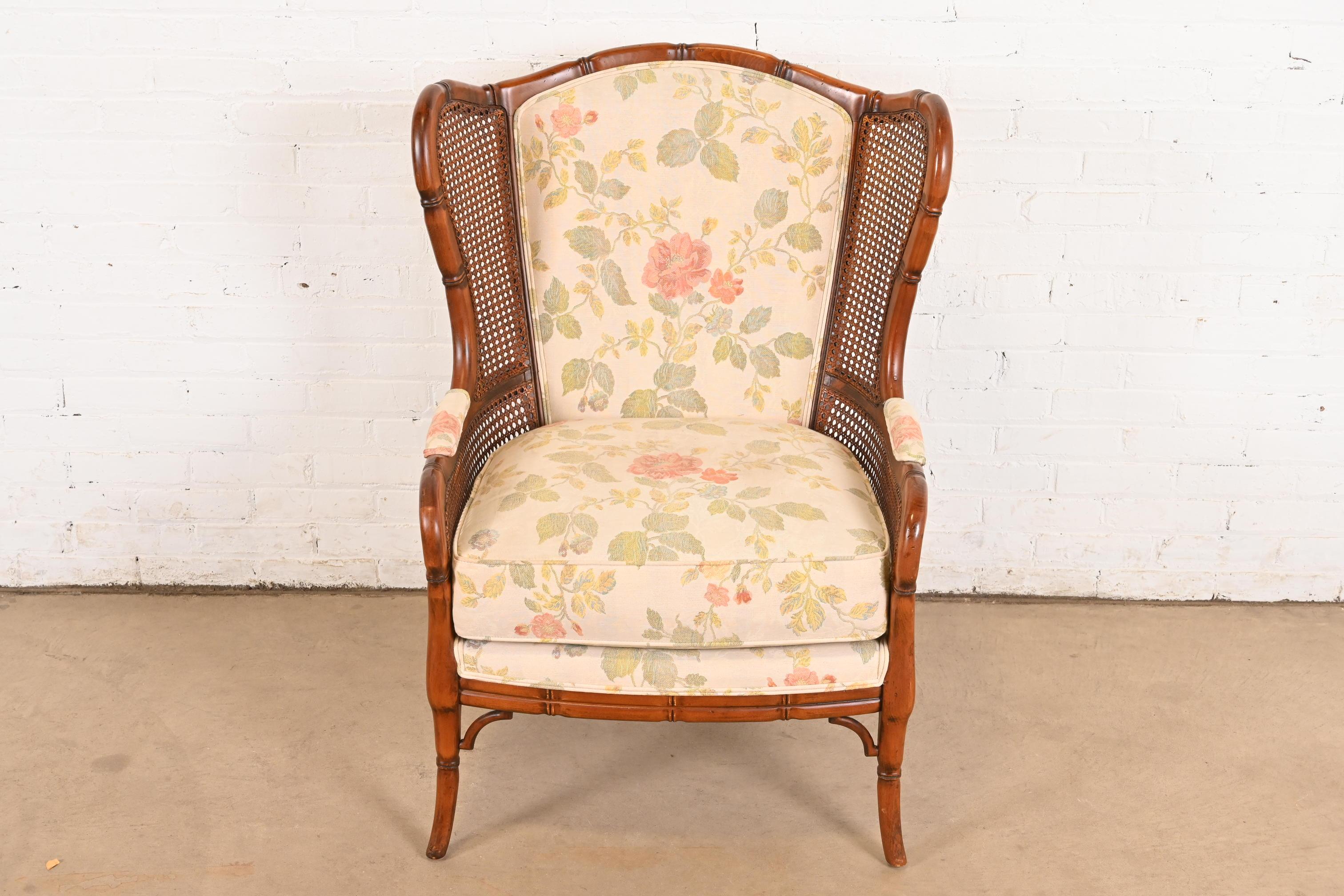 American Regency Faux Bamboo and Cane Wingback Upholstered Lounge Chair For Sale