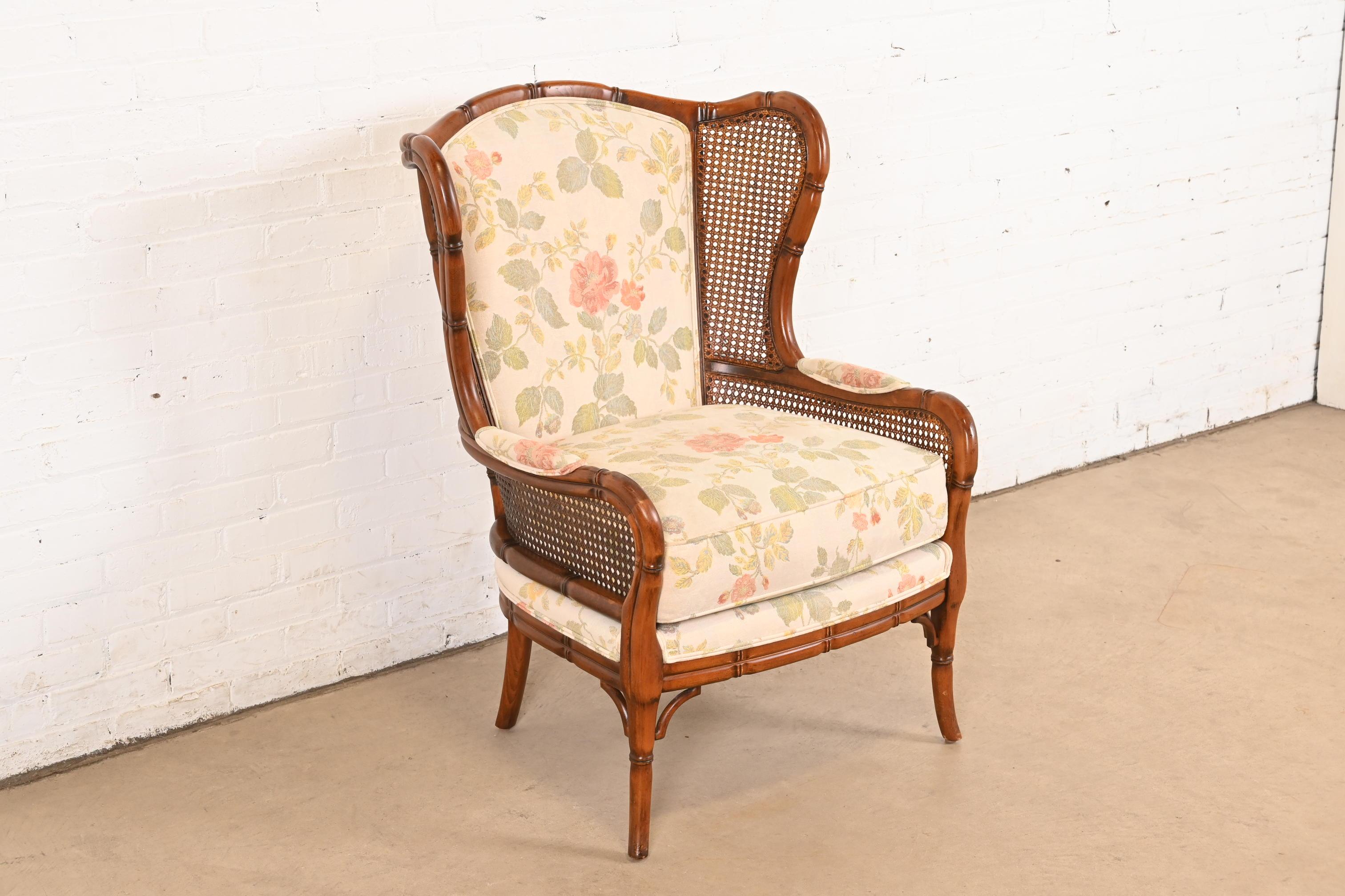 Contemporary Regency Faux Bamboo and Cane Wingback Upholstered Lounge Chair For Sale