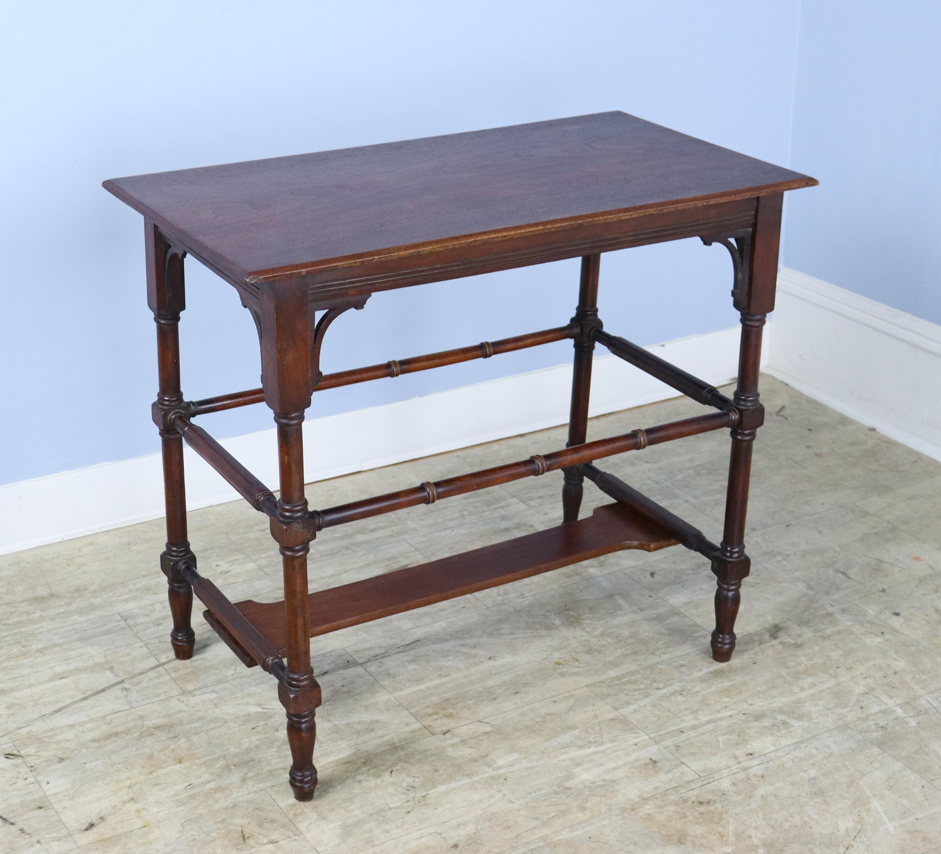 A graceful Regency Era mahogany plant stand or side table with lots of good bamboo detail on the legs and stretchers. Some slight wear on the top left corner, as shown in thumbnails.