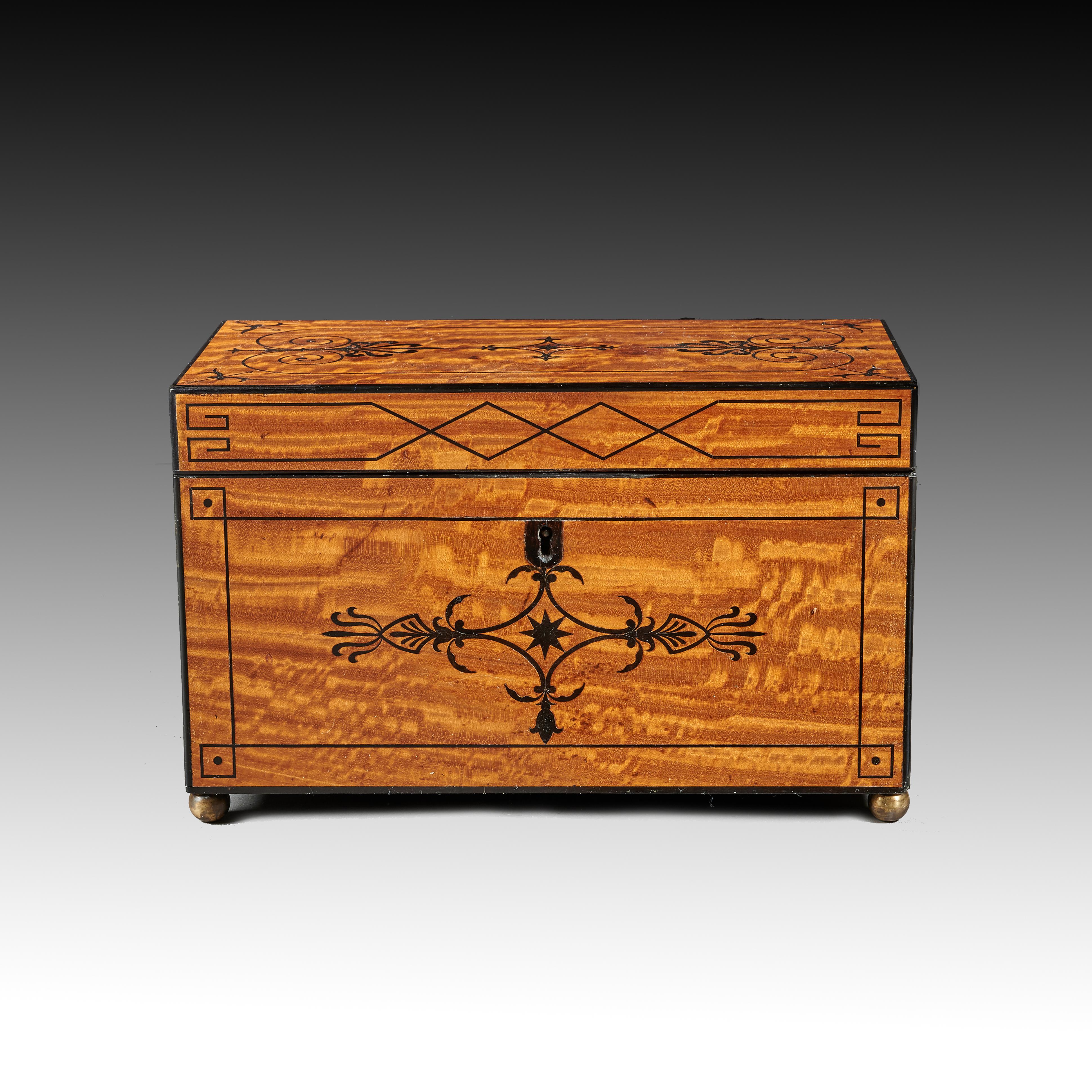 A very fine quality and rare Regency East Indian Satinwood and ebony inlaid tea caddy in the manner of George Oakley.

English Regency period, circa 1810.

A wonderful quality tea caddy, finely inlaid with ebony Greek key geometric banding,