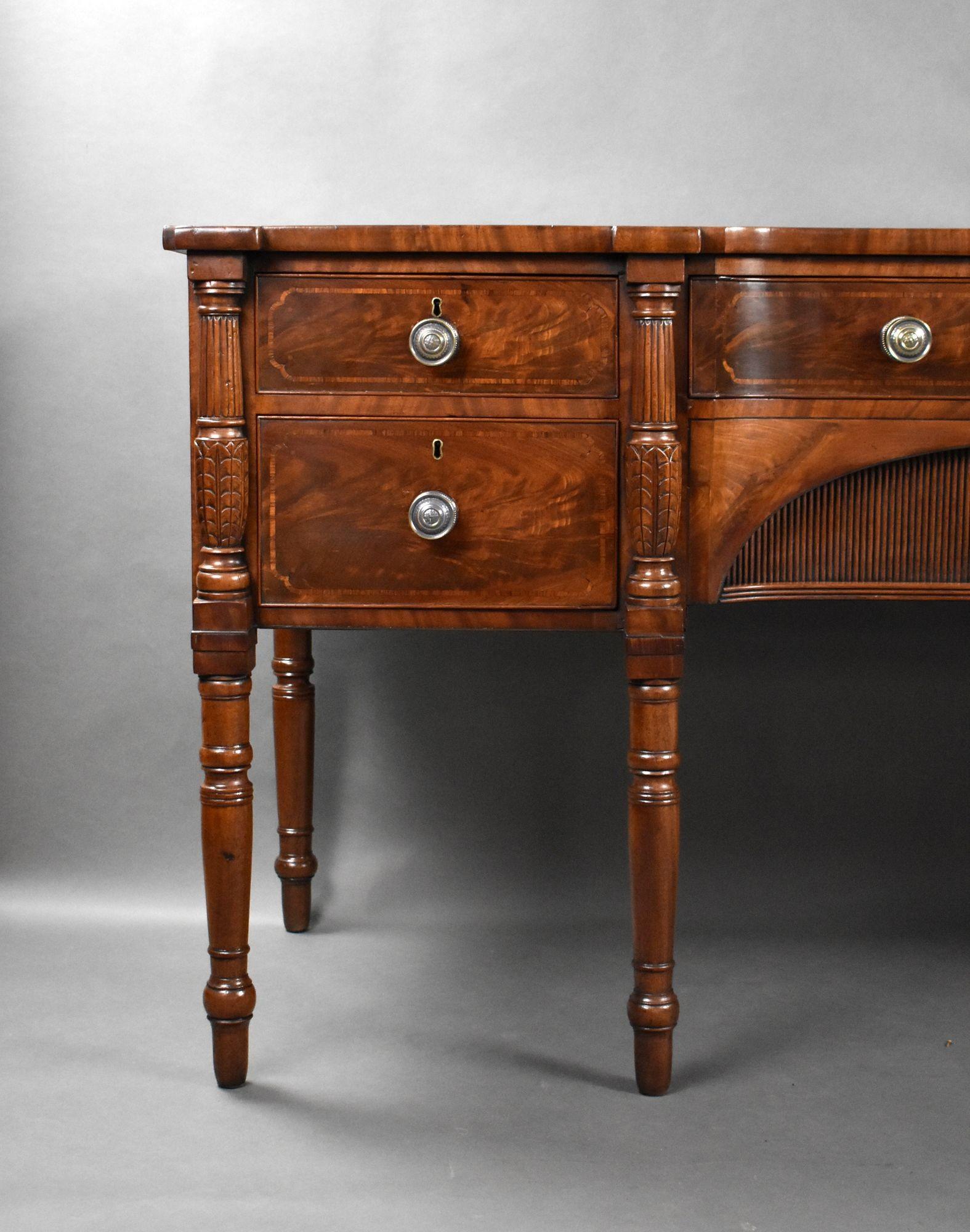 For sale is a good quality Regency flame mahogany sideboard, having an arrangement of four drawers, each with brass handles, the sideboard stands on elegantly turned legs and is in excellent condition for its age. This piece was once situated in