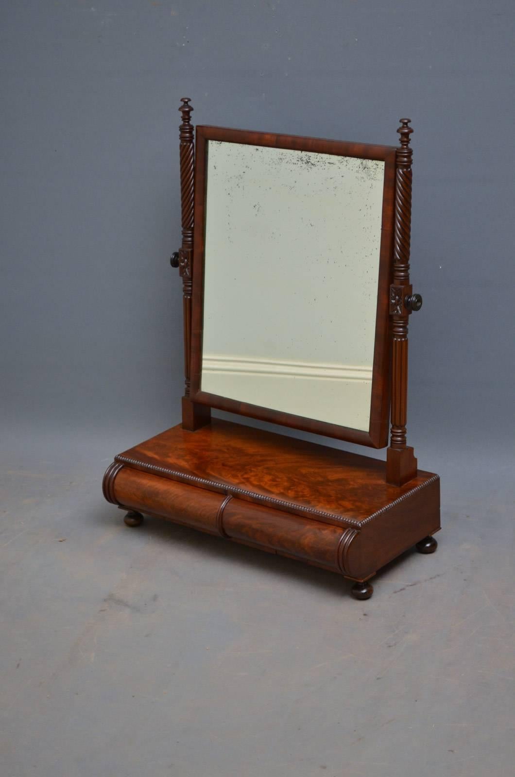 K0341, fine quality and very elegant, Regency mahogany toilet mirror, having original mirror plate with some foxing in reeded and twisted supports terminating in flamed mahogany base with three oak lined cylinder drawers, all standing on turned