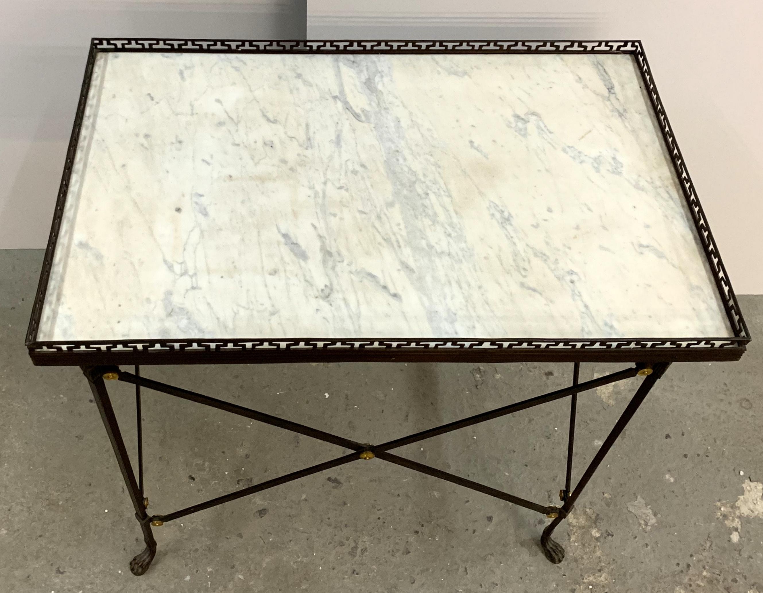 A wonderful regency French ormolu bronze and pierced gallery marble top gueridon side table with paw feet.