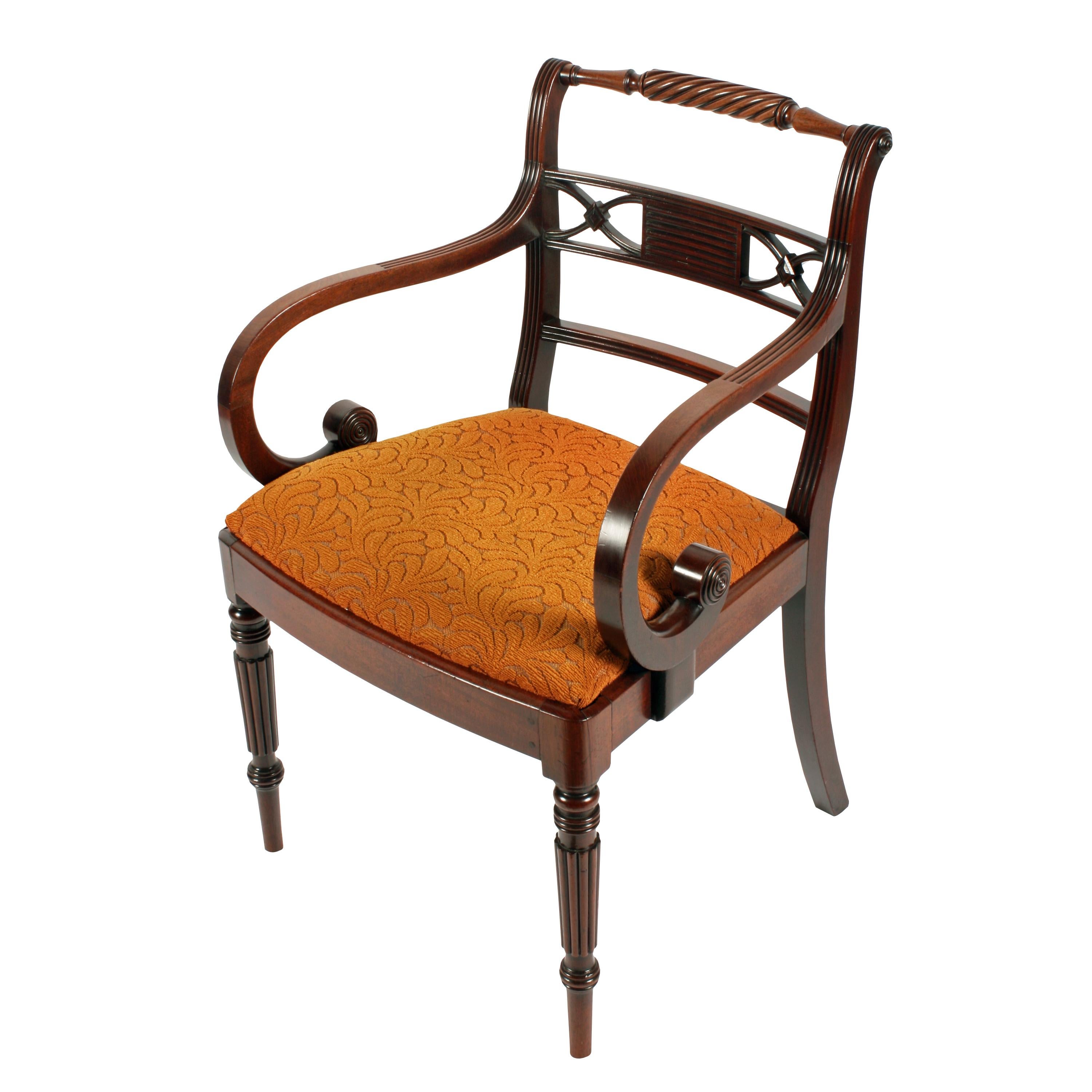 Regency 'Gillows' design elbow chair

 

An early 19th century Regency mahogany elbow or arm chair attributed to Gillows of Lancaster.

The chair back has a rope twist top rail with reed cross rails below and a reeded double 'X' back