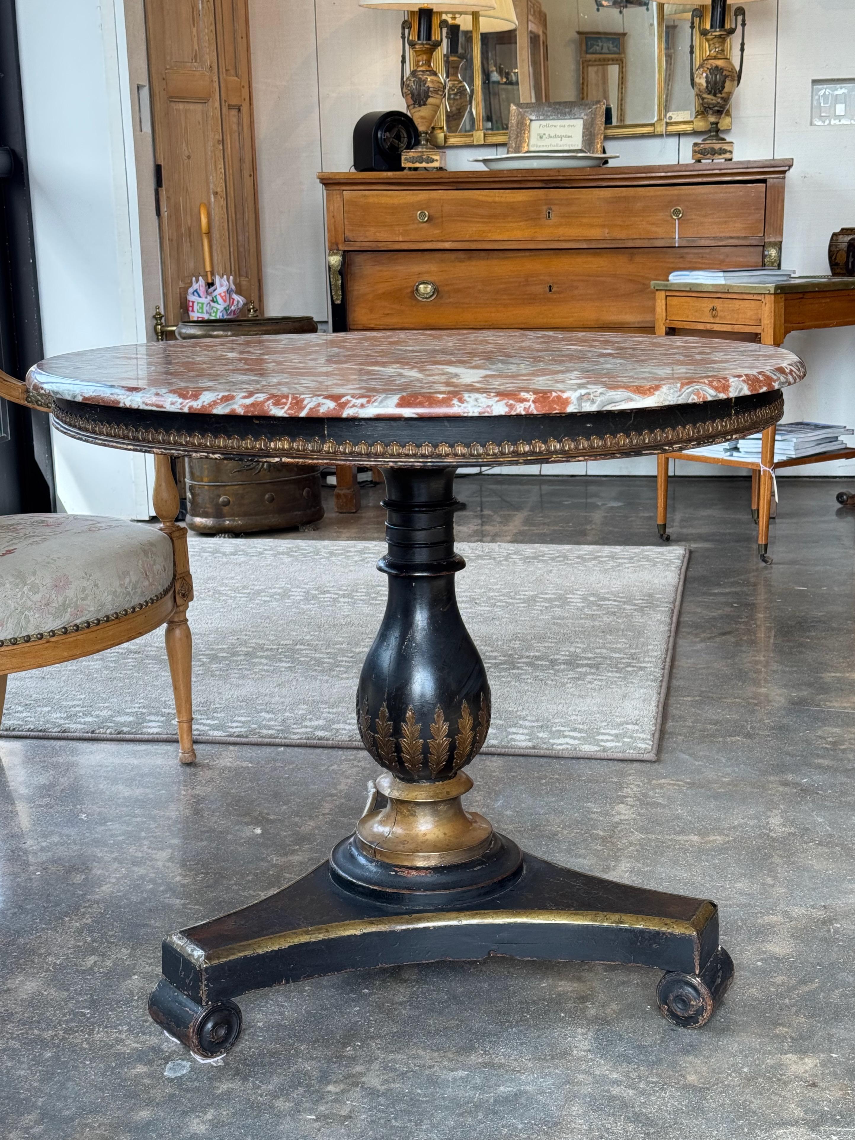 French Regency Gilt and Ebonized Center Table With Marble Top