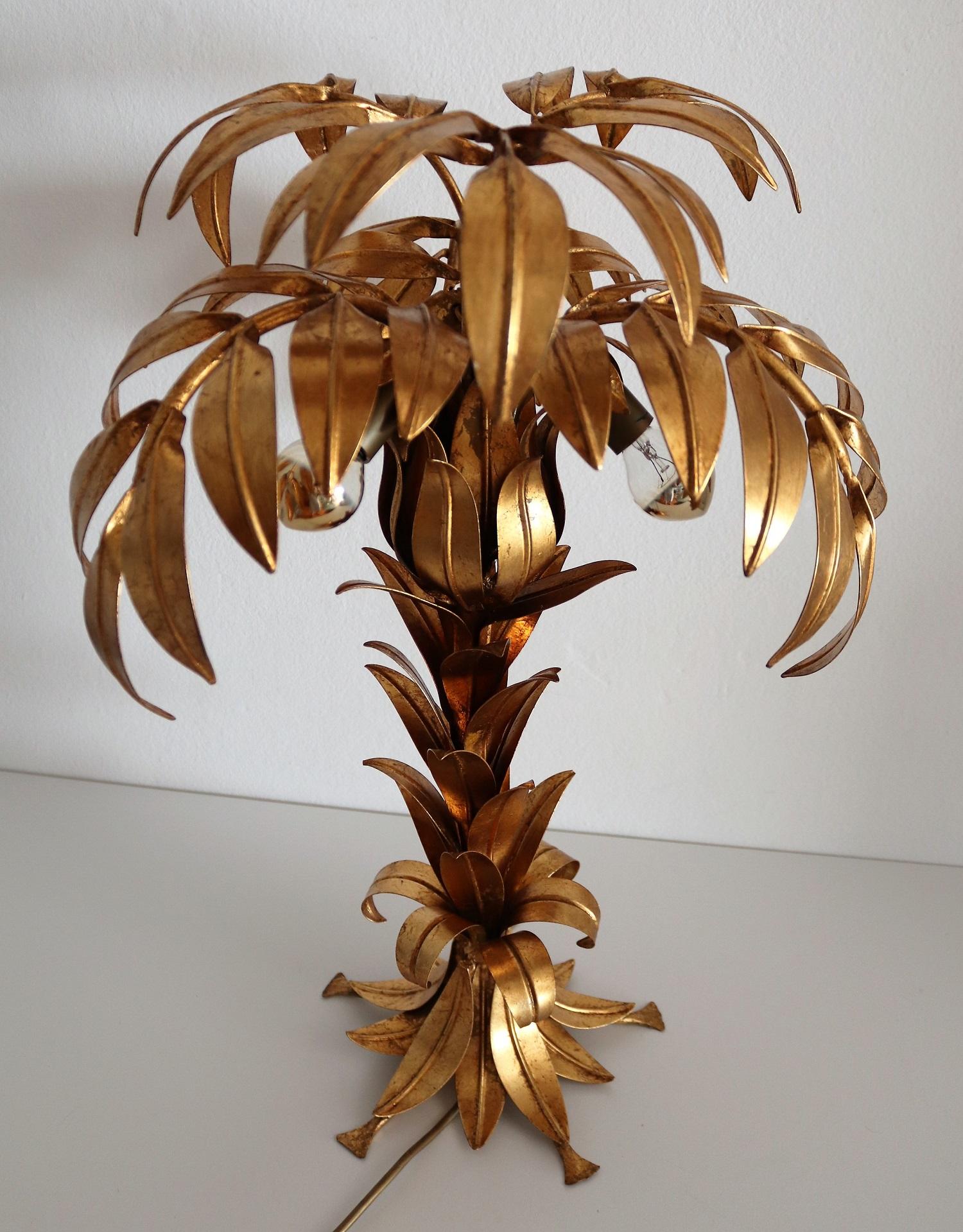 Gorgeous patinated gilt palm tree table lamp by German designer Hans Kögl (Koegl) with three small light sockets.
Wonderful eye-catcher in any Hollywood Regency style and mid-century interior.
Very good to excellent original condition.