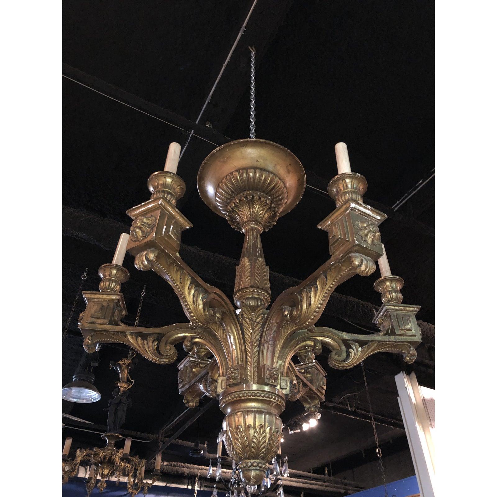 Regency Gilt Wood Chandelier, 19th Century Continental. 6-Armed Gilt carved wood chandelier. The chandelier is of classic style.