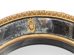Regency Giltwood And Ebonized Convex Mirror