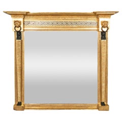 Espejo sobremantel de madera dorada y ebonizada Regency