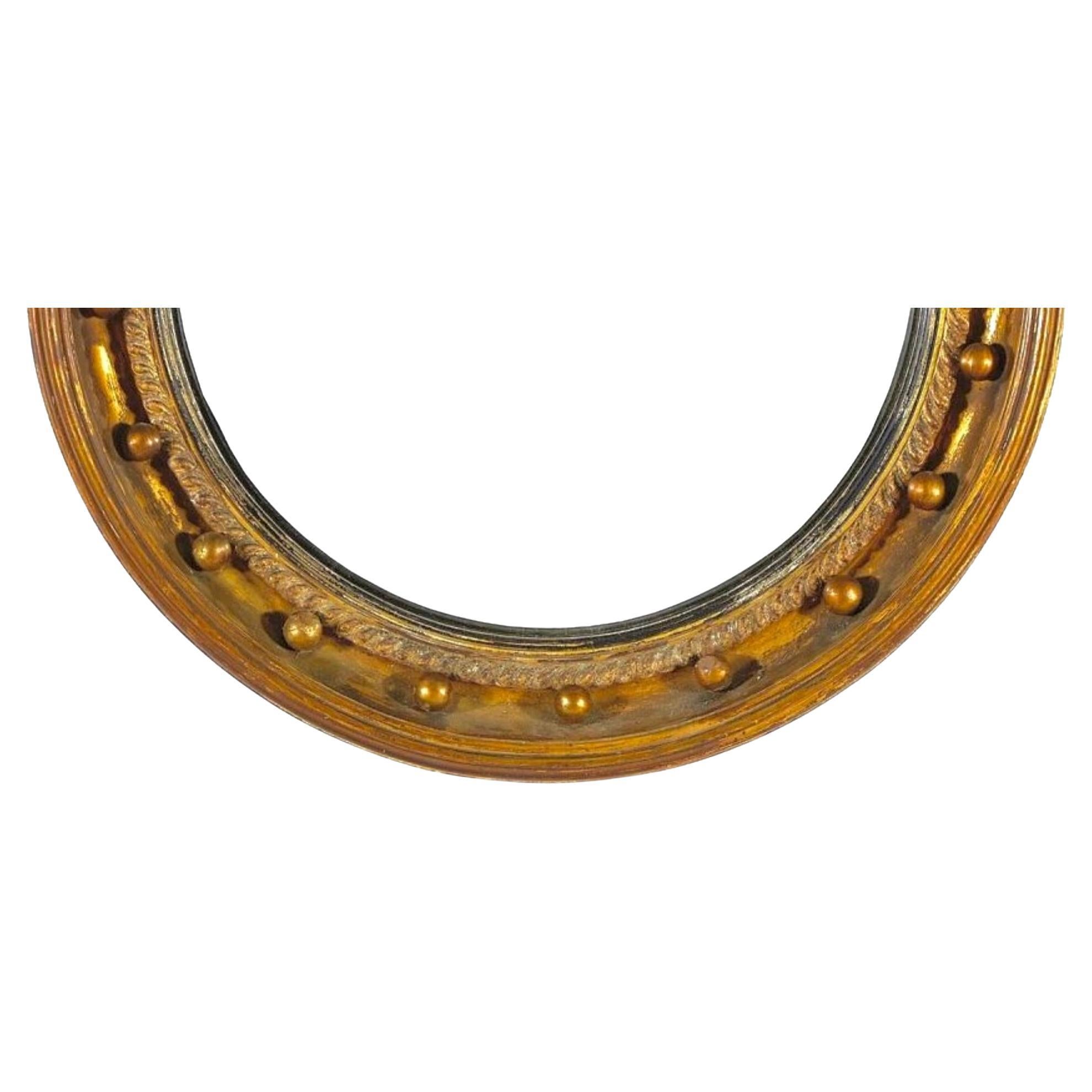 Regency Giltwood Convex Bullseye Mirror with Eagle Crest In Good Condition For Sale In Bradenton, FL