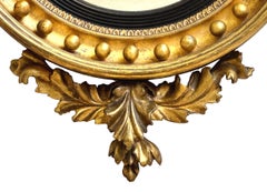 Miroir convexe Regency en bois doré