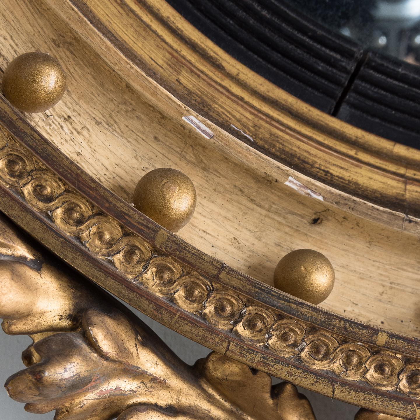 XIXe siècle Miroir convexe Regency en bois doré en vente