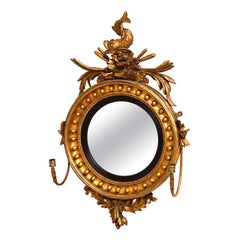 Miroir convexe Regency en bois doré