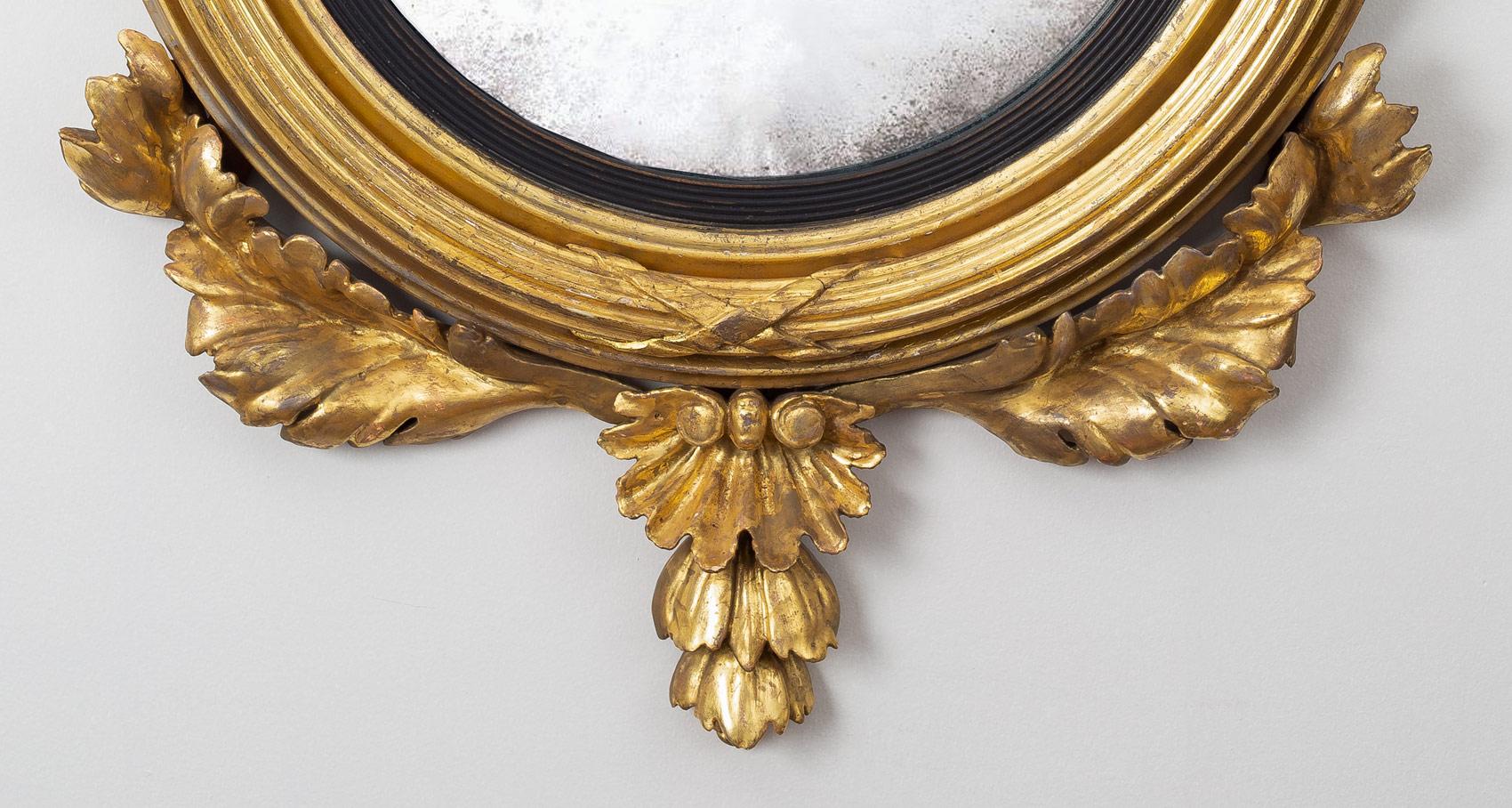 19th Century Regency Giltwood Convex Mirror with Dolphins, circa 1810 For Sale